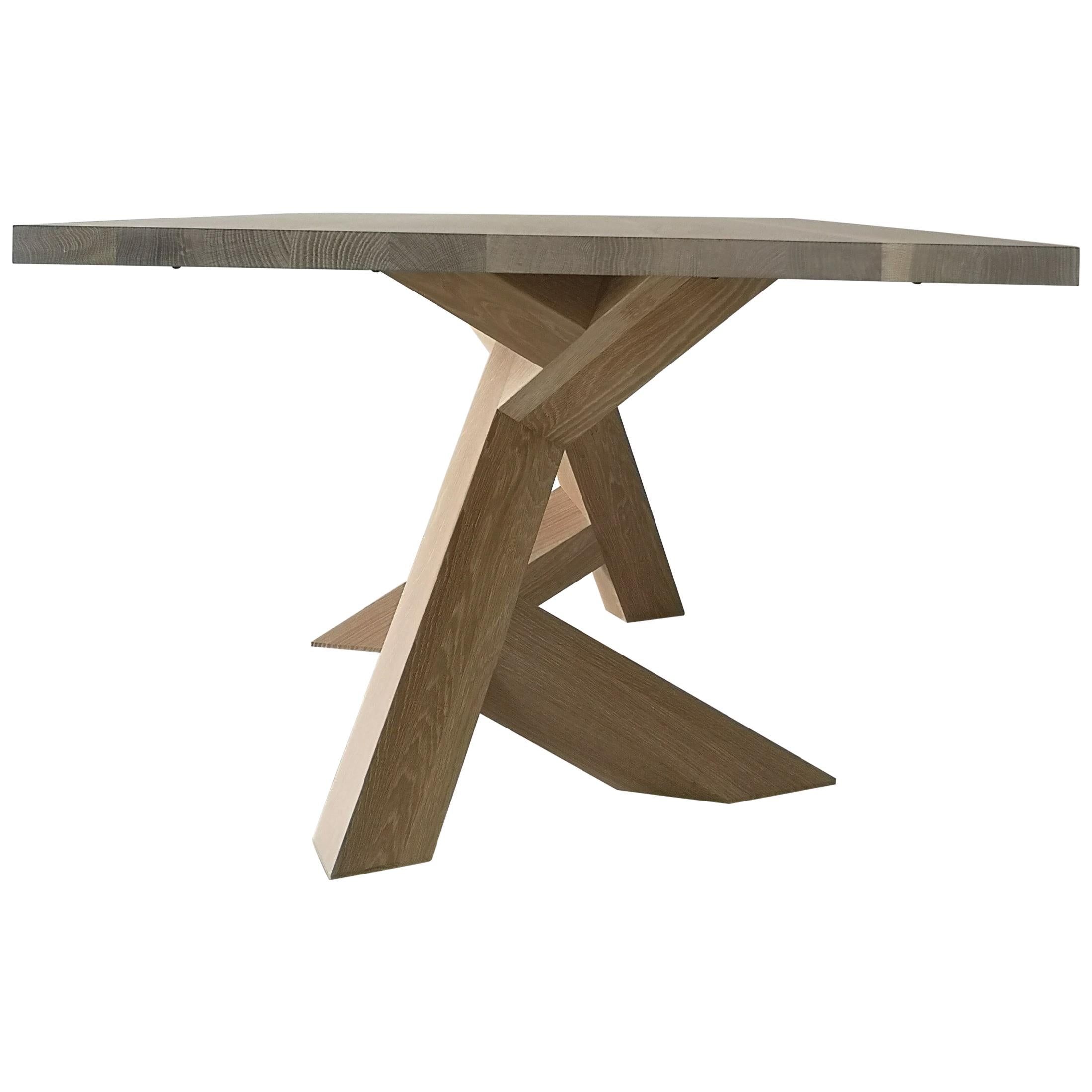 The Iconoclast dining table is made of 100% solid, hardwood and features a unique pedestal base. This piece commands attention and is the perfect centre piece for any open plan dining room, from modern to transitional, also makes a powerful