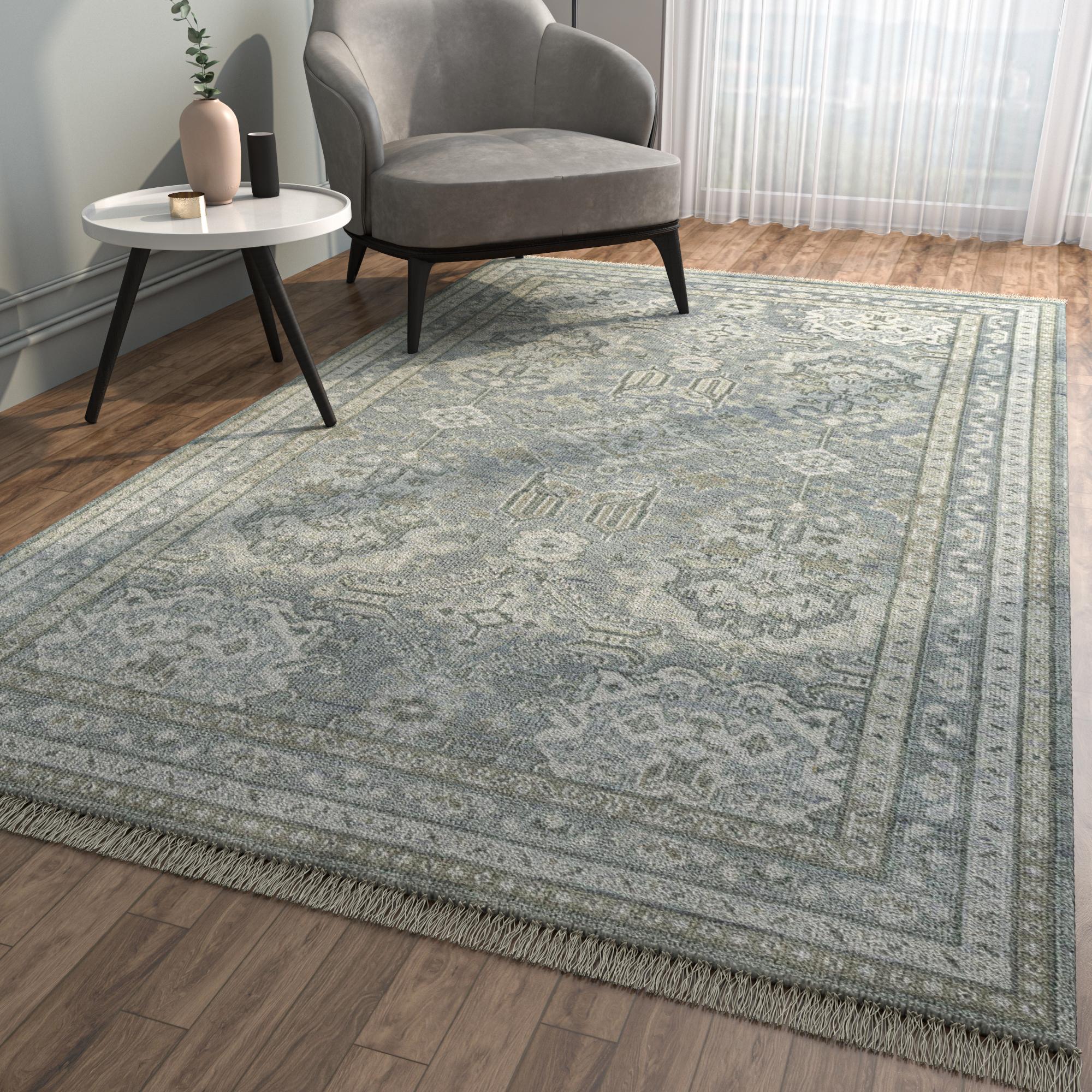 We present a masterpiece in the form of this Hand Knotted Rug, skillfully crafted in the heart of rural India. The Glacier Gray base sets the stage for a harmonious fusion, while the BlueBell border adds a touch of sophistication. Meticulously