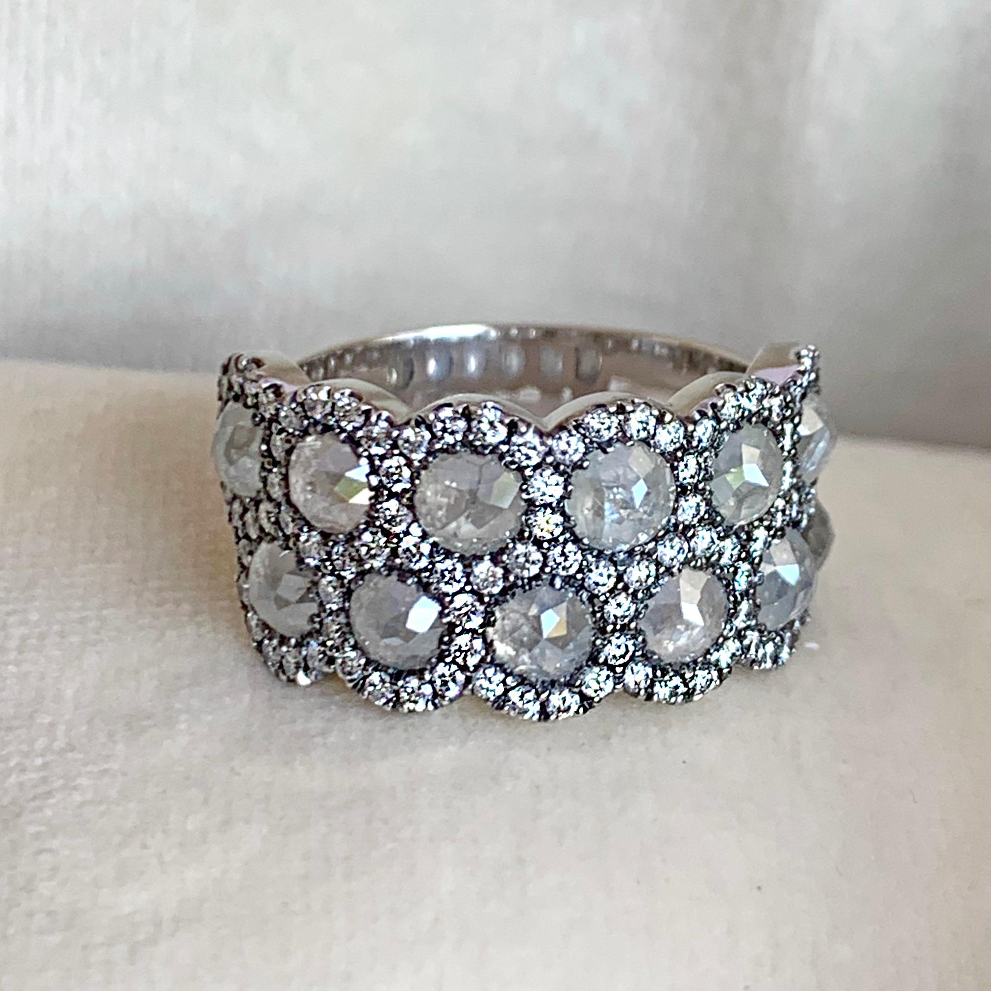 One of a kind Alliance ring handmade in Belgium in 2017 by jewellery artist Joke Quick, in 18K white gold 9 g. Set with 12 Icy rose-cut diamonds and 102 white DEGVVS brilliant-cut diamonds. Total carat diamonds: 5,42 carat. Size EU 54  US 6 3/4 .