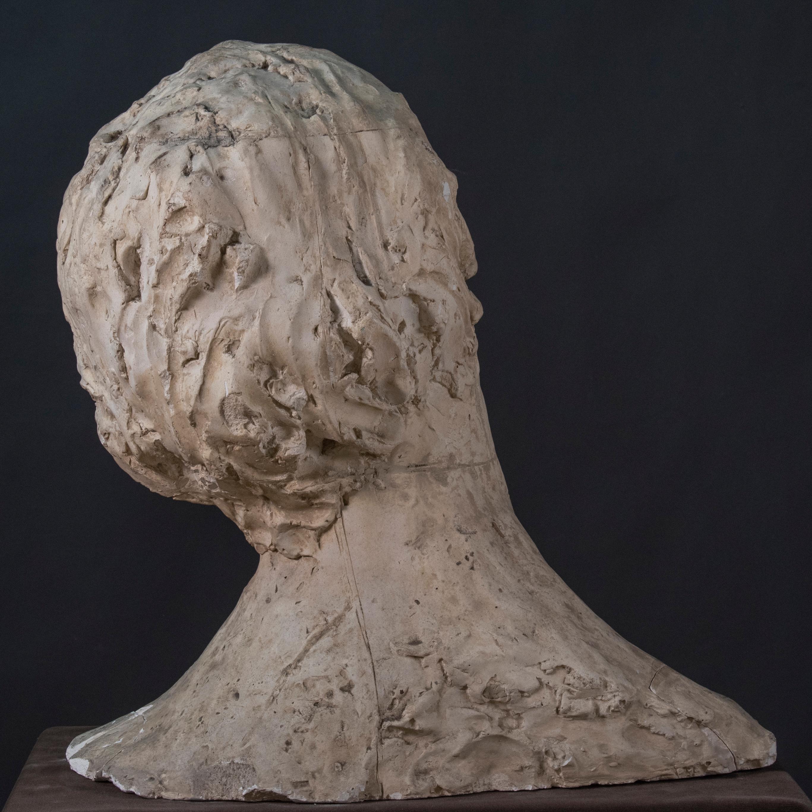 1950s Italian Modern Plaster Sculpture “Head of a young boy” by Ida Fuà 

Very important  plaster sculpture depicting a young boy by the great italian artist Ida Fuà 
The boy, caught in a gaze of rare intensity and depth, has his head bowed to one