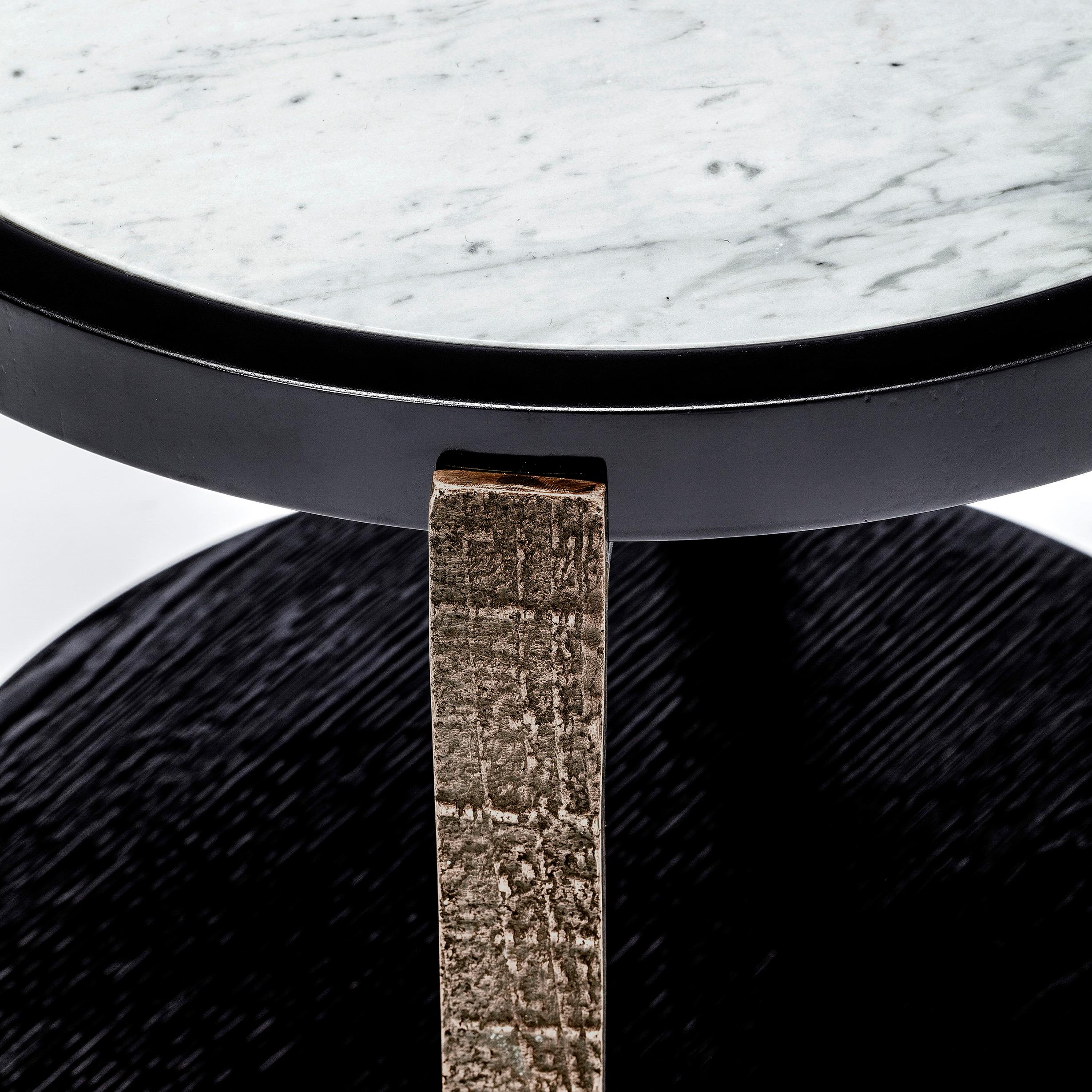 Ida Side Table, Sand Brushed Black Oak and Carraca Marble Top by Duistt

The Ida collection is a luxurious set of two upholstery pieces and a side table. They all feature sand brushed black oak finish and carved bronze details.

Shown in sand