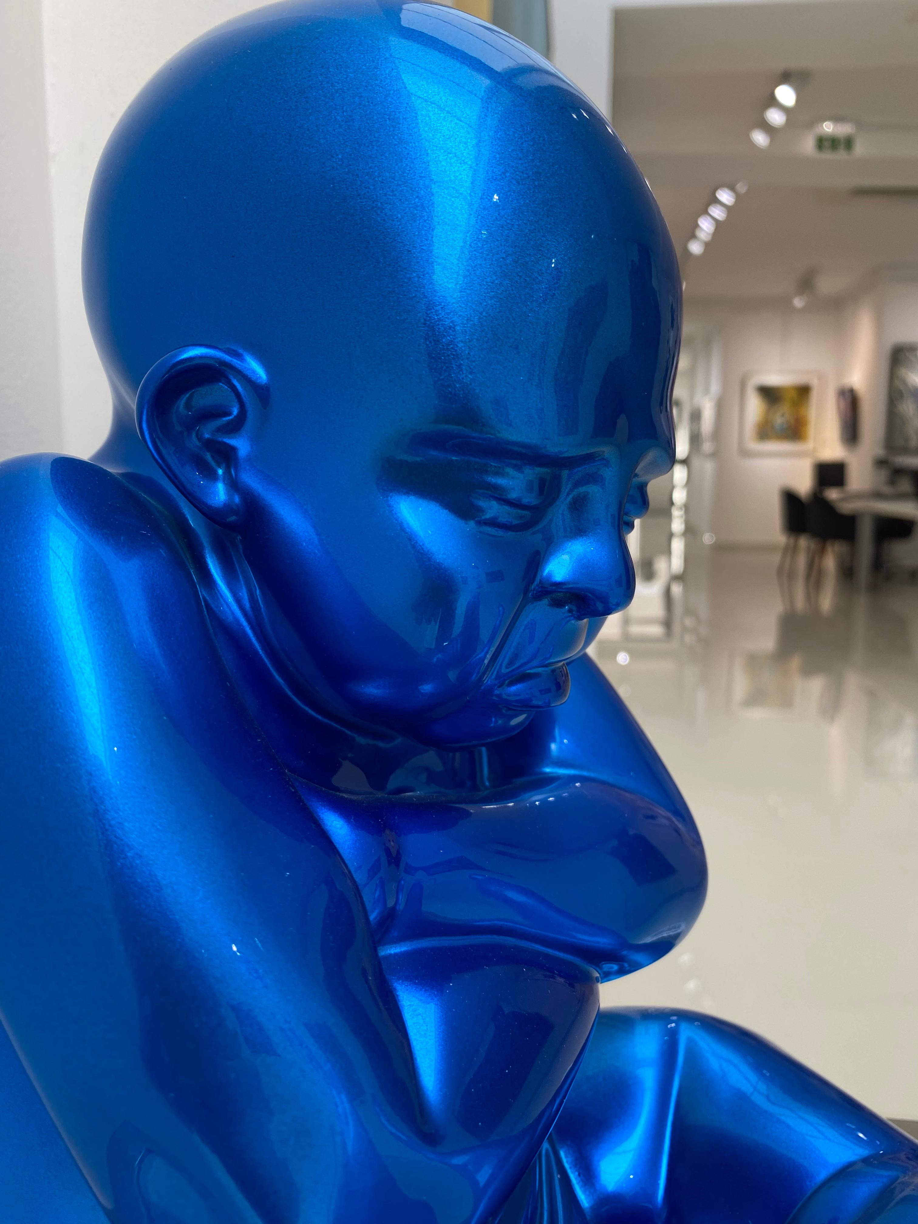 This striking piece, known for its bold red finish and lifelike detail, exemplifies Zareski's unique artistic vision and mastery in sculpture.

