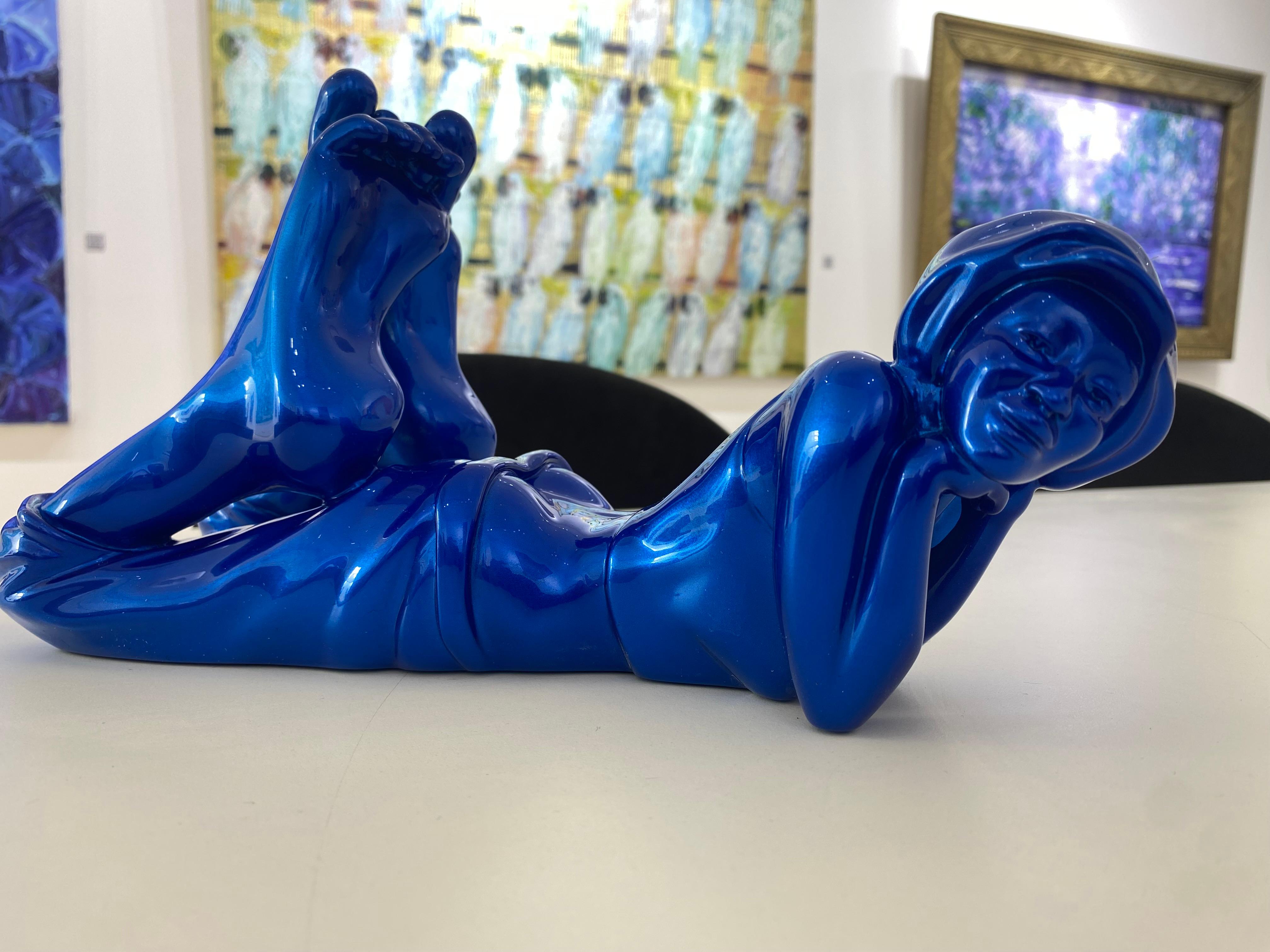 This striking piece, known for its bold red finish and lifelike detail, exemplifies Zareski's unique artistic vision and mastery in sculpture.

