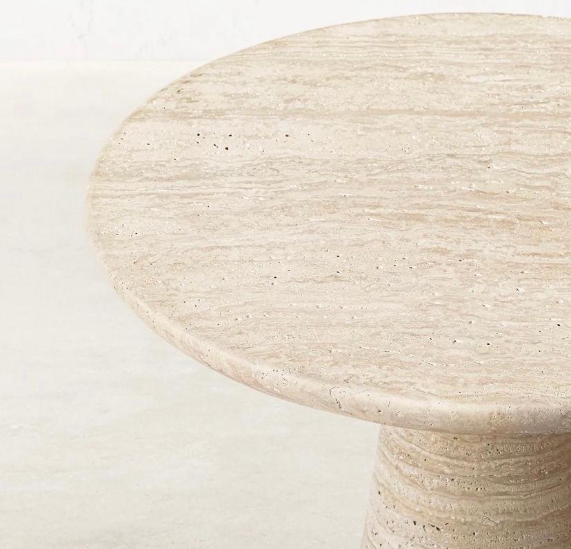 IDE Table: a stunning piece that embodies the natural elegance of travertine stone. This table is crafted with precision and attention to detail, making it a unique addition to any living space.

46 x 51 H cm