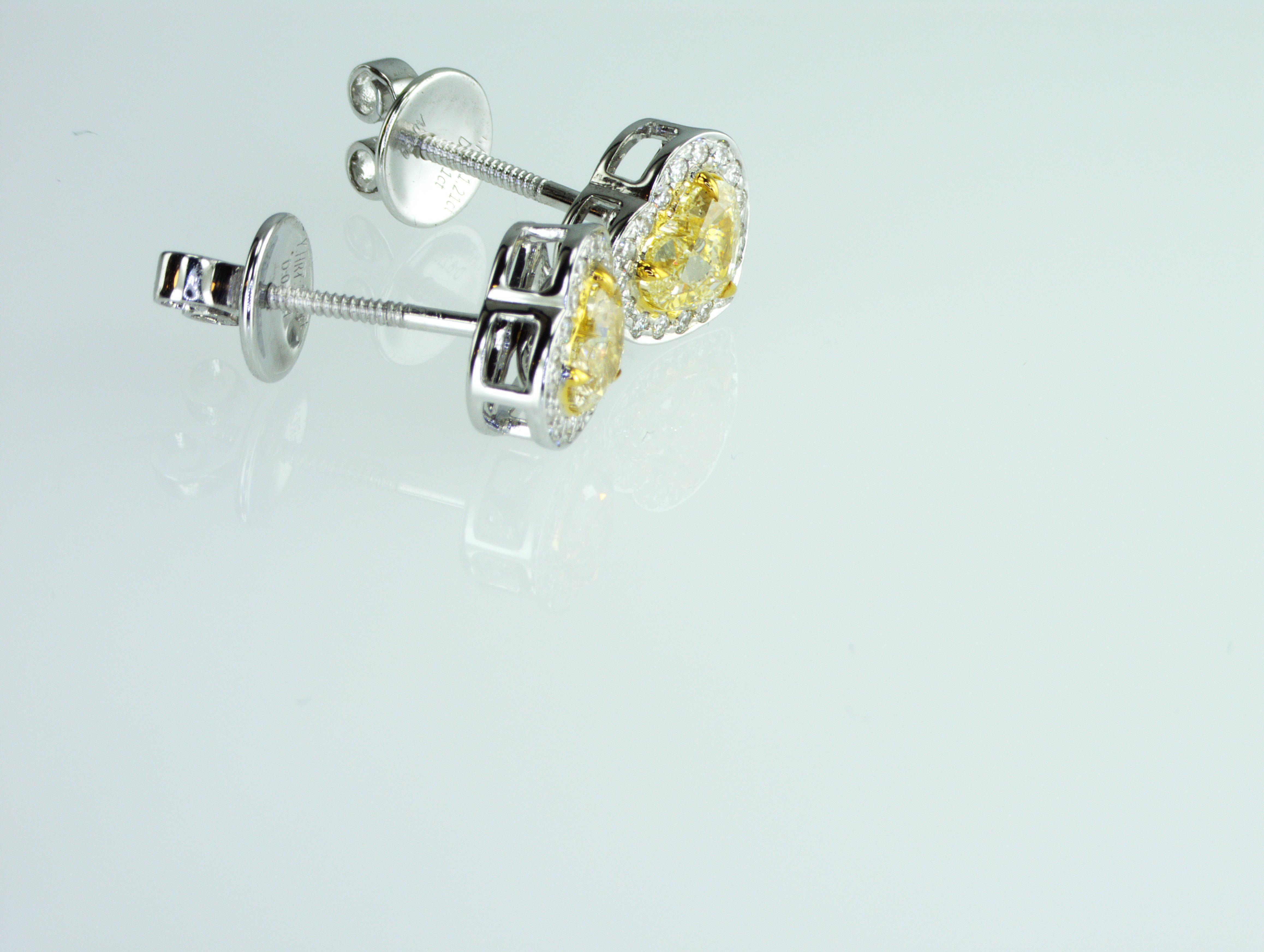 Heart Cut IDL certified 1.42 carat Fancy Yellow Heart shape natural diamonds Earrings For Sale