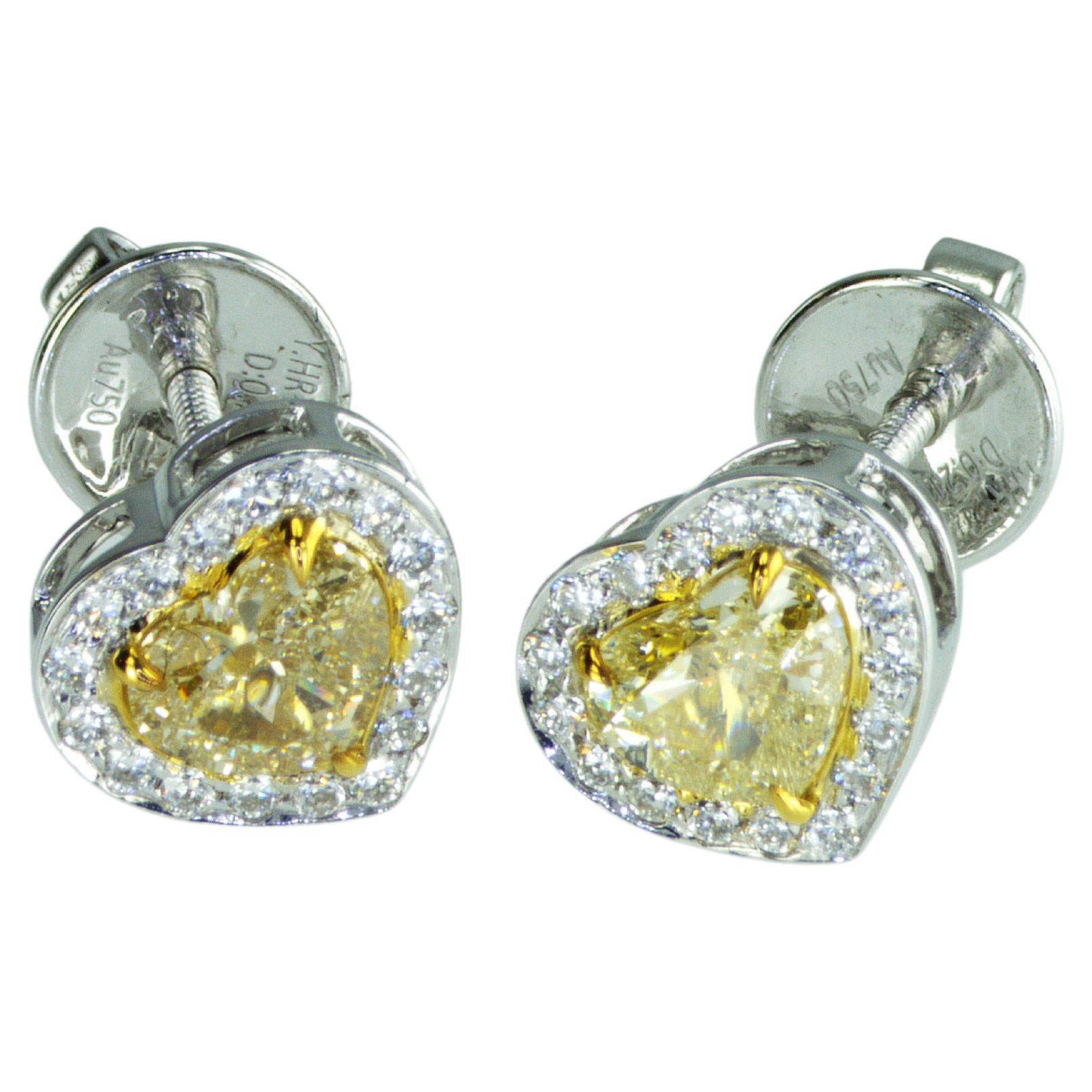 IDL certified 1.42 carat Fancy Yellow Heart shape natural diamonds Earrings For Sale