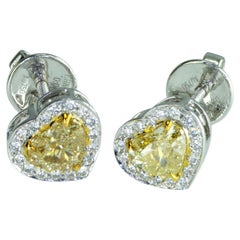 IDL certified 1.42 carat Fancy Yellow Heart shape natural diamonds Earrings