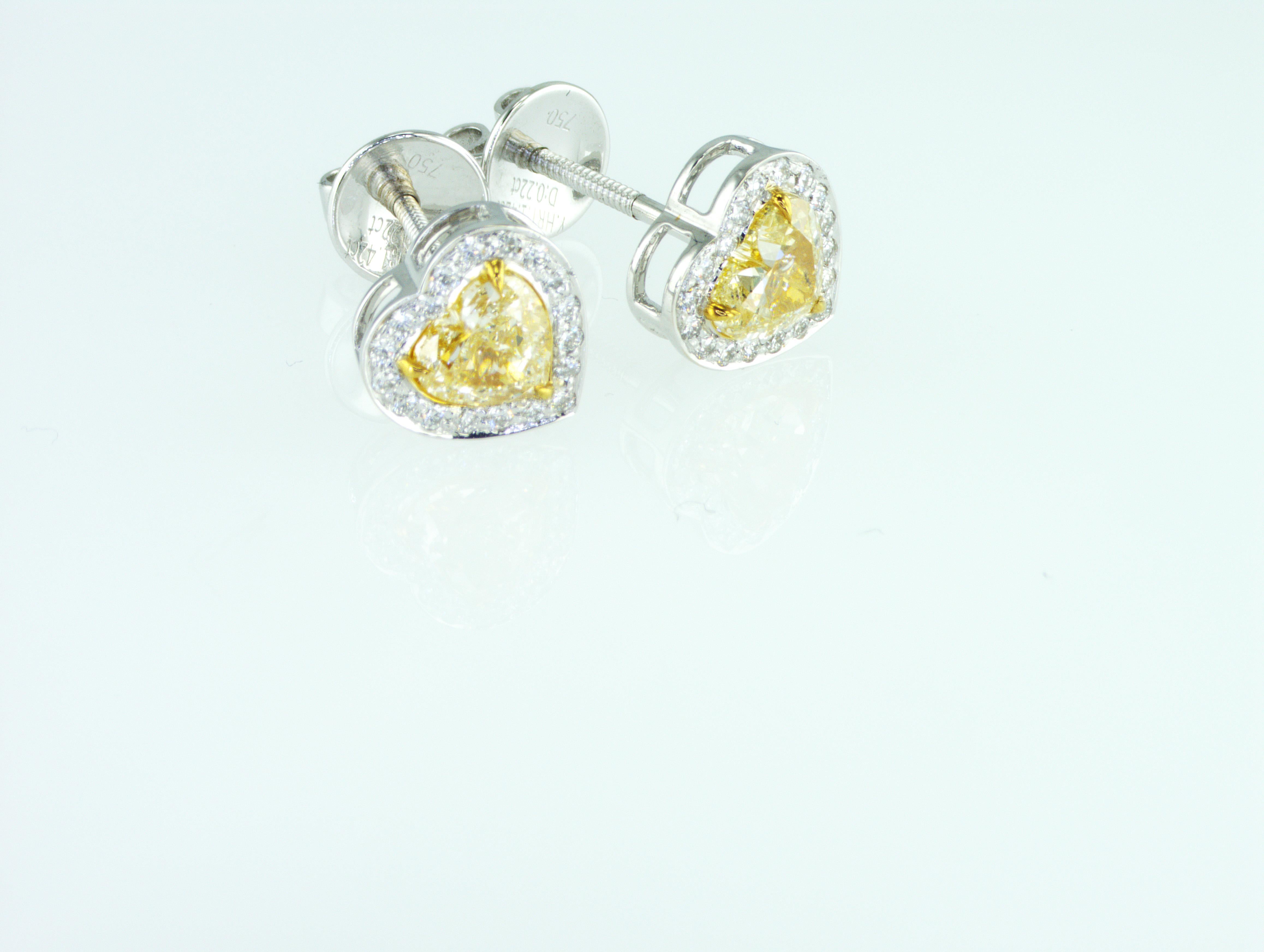 We are natural diamond production company located in Dubai.
Rare 1.66 carat Fancy Yellow Heart shape natural diamonds Earrings. 
Total weight of natural diamonds is 1.66 carat. All our diamonds, jewelry and gemstones are certified by well known