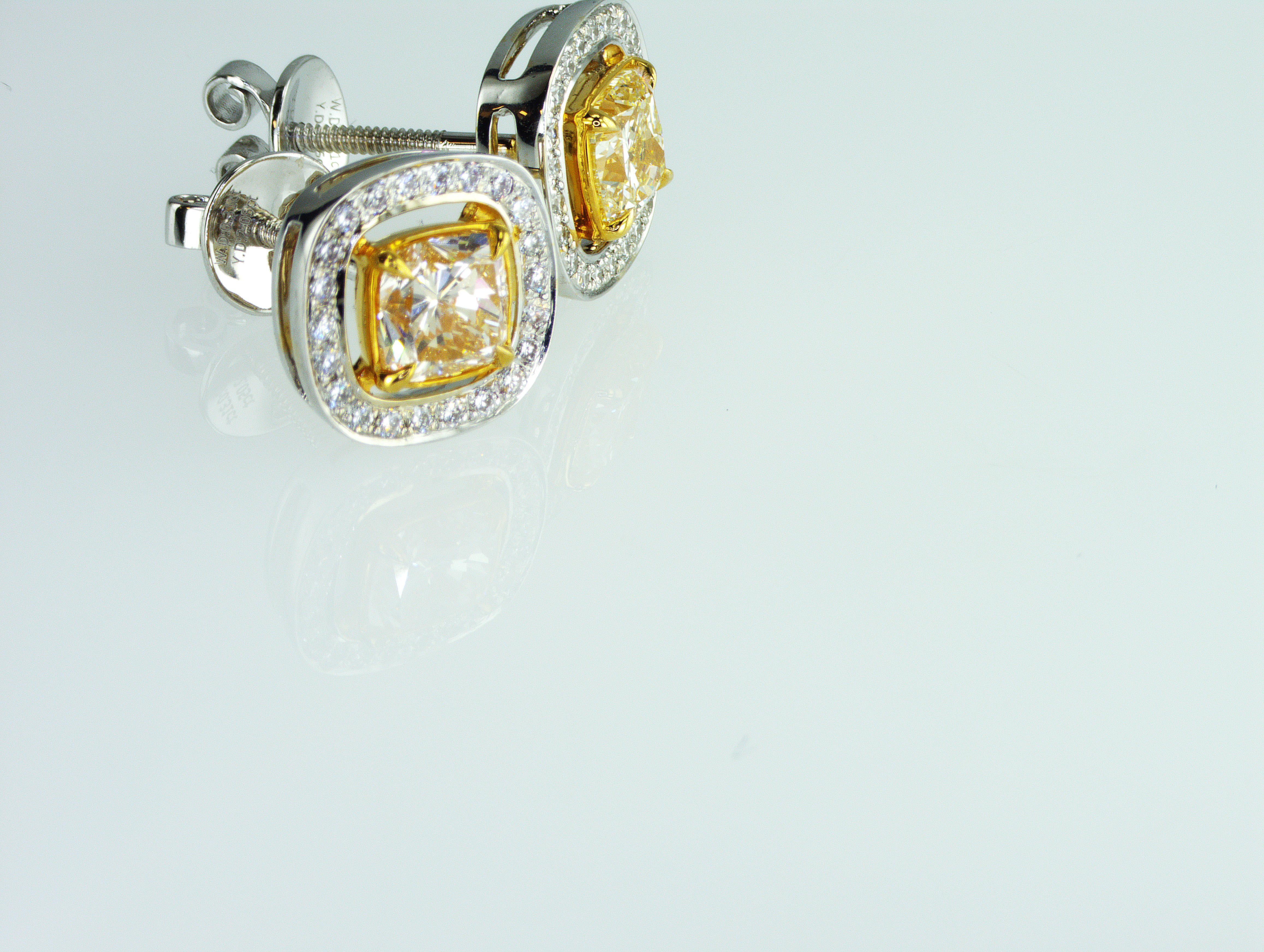 We are natural diamond production company located in Dubai.
This gorgeous IDL certified 2.05 carat Yellow Diamonds Studs Earrings you can get for a very good price. Total weight of natural diamonds is 2.36 carat. All our diamonds, jewelry and