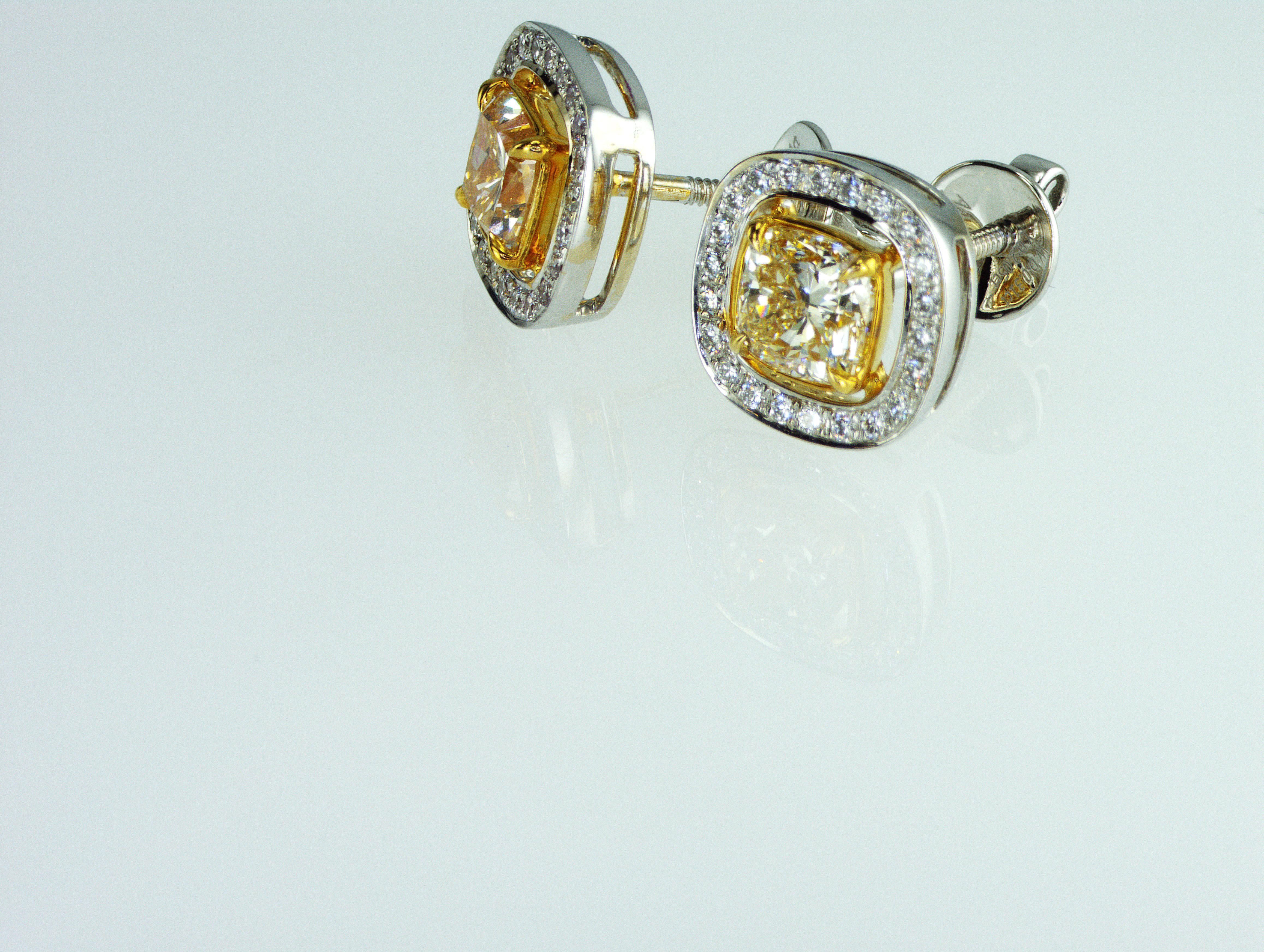Modern IDL certified 2.05 carat Yellow Diamonds Studs Earrings For Sale