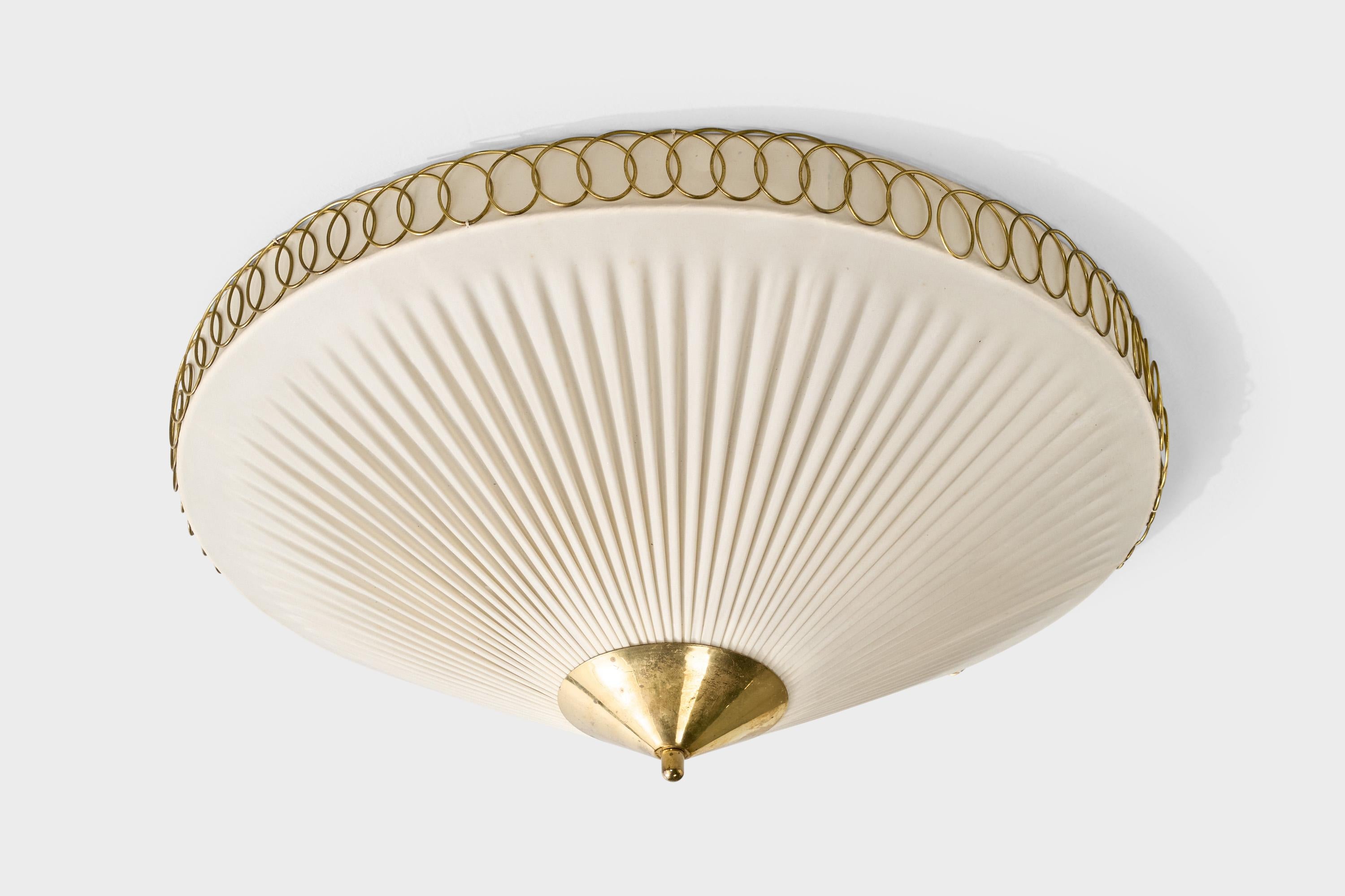 A brass and off-white fabric flush mount produced by Idman, Finland, c. 1950s.

Overall Dimensions (inches): 10” H x 24.5” Diameter

Bulb Specifications: E-26 

Number of Sockets: 2

All lighting will be converted for US usage. We are unable to