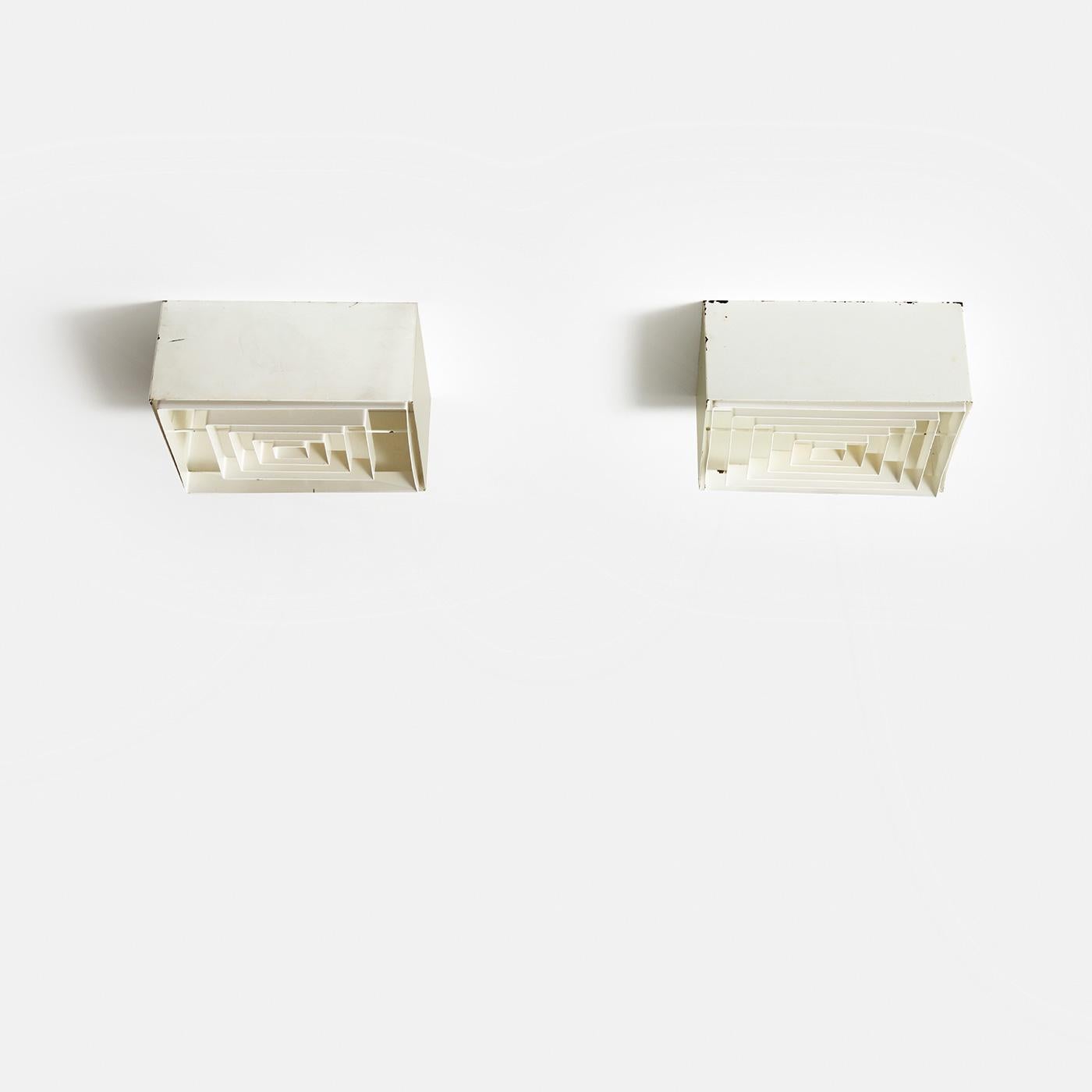 Pair of rare metal ceiling lamps, model H2-55/30, manufactured by Idman in Finland, 1964.

These rare and unique sculptural ceiling lamps were manufactured by the company Idman in Finland in 1964, the same exact company that manufactured various