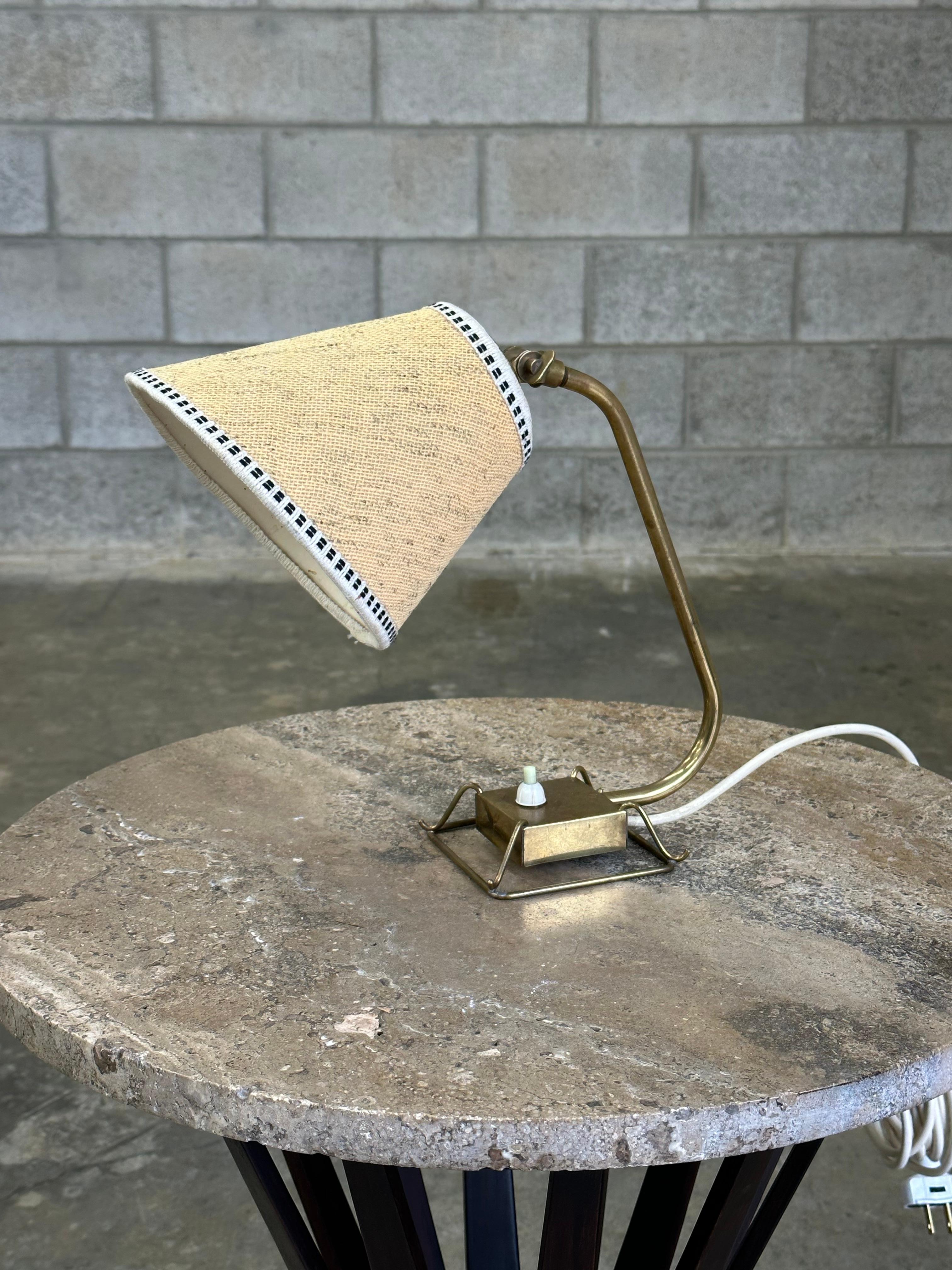 A wonderful lamp produced by Idman circa 1953. Design by Maura Almari. Great design allows for use as either a table lamp or can be hung on the wall. Beautiful details throughout. 

Other notable designers include Paavo Tynell and manufacturers