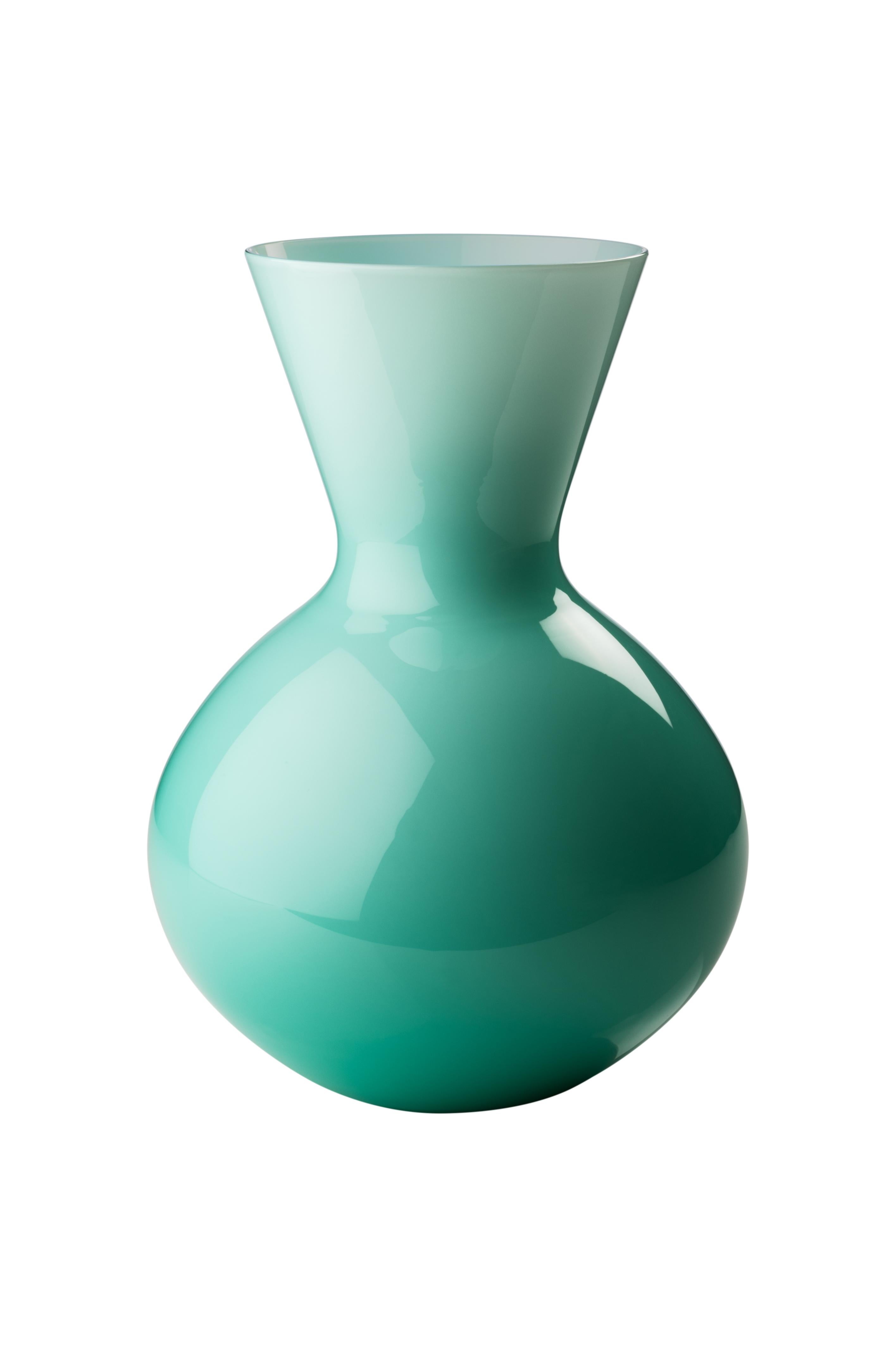 Venini glass vase with round body and angular shaped neck in mint green designed in 2016. Perfect for indoor home decor as container or strong statement piece for any room. Also available in other colors on 1stdibs.

Dimensions: cm diameter x cm
