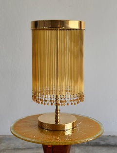 IDRIA-T2 Tischlampe aus Messing mit Tropfen aus Bernsteinglas