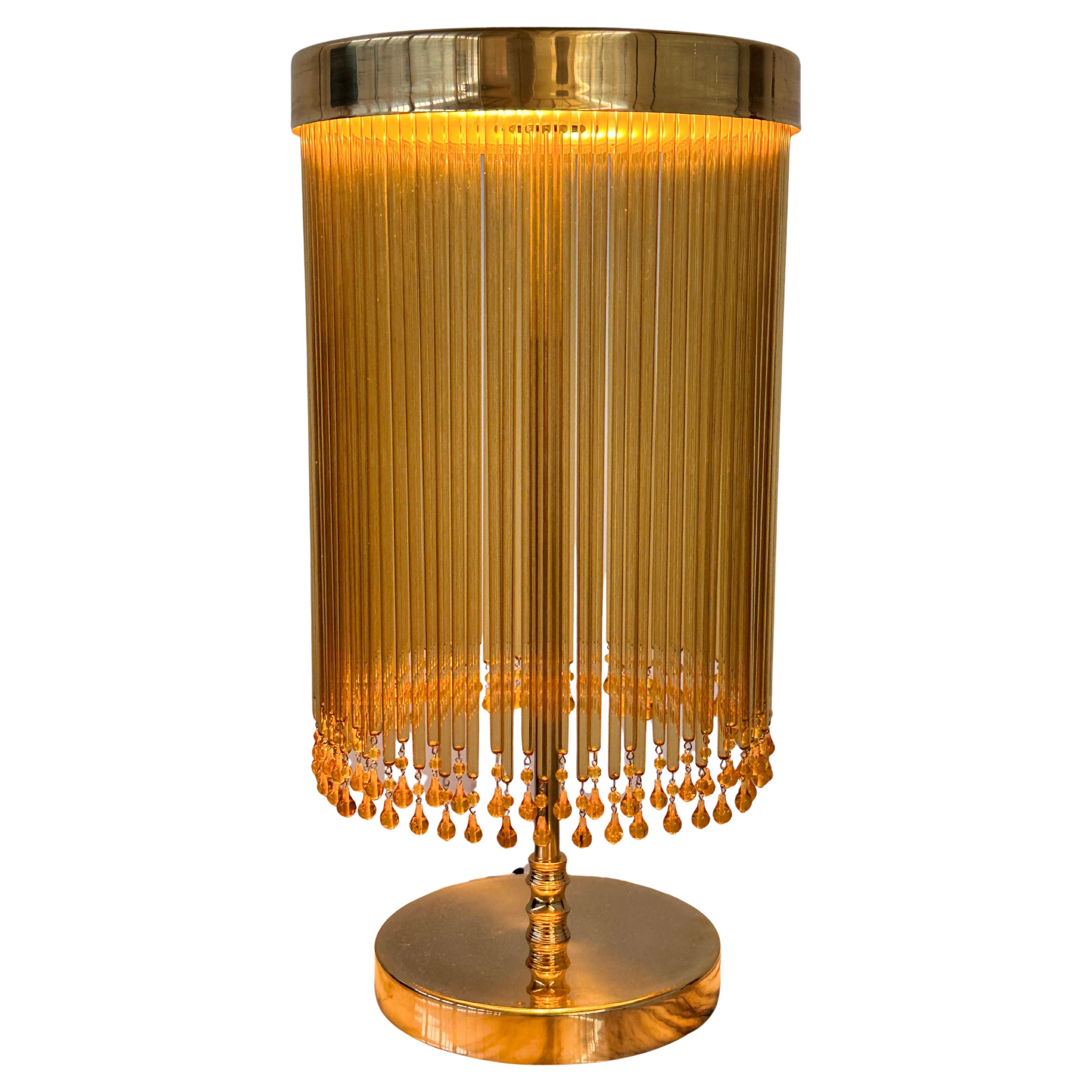 IDRIA-T2 Tischlampe aus Messing mit Tropfen aus Bernsteinglas