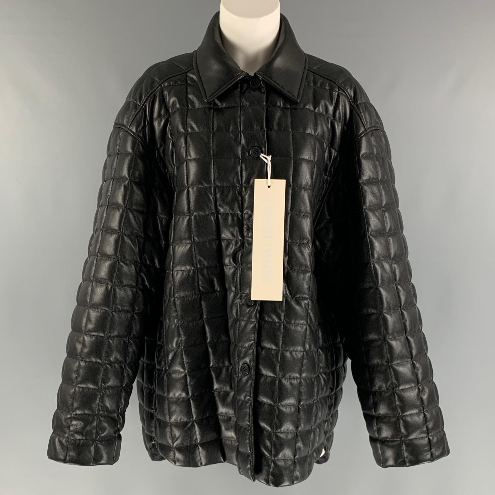 IENKI IENKI 'KALIK DOWN SHIRT w.Tote' Quilted Jacket comes in black polyester blend material featuring an oversized fit, classic shirt shape, side pockets, and button closure. Comes with Tote bag.

New with Tags.
Marked: M

Measurements:

Shoulder: