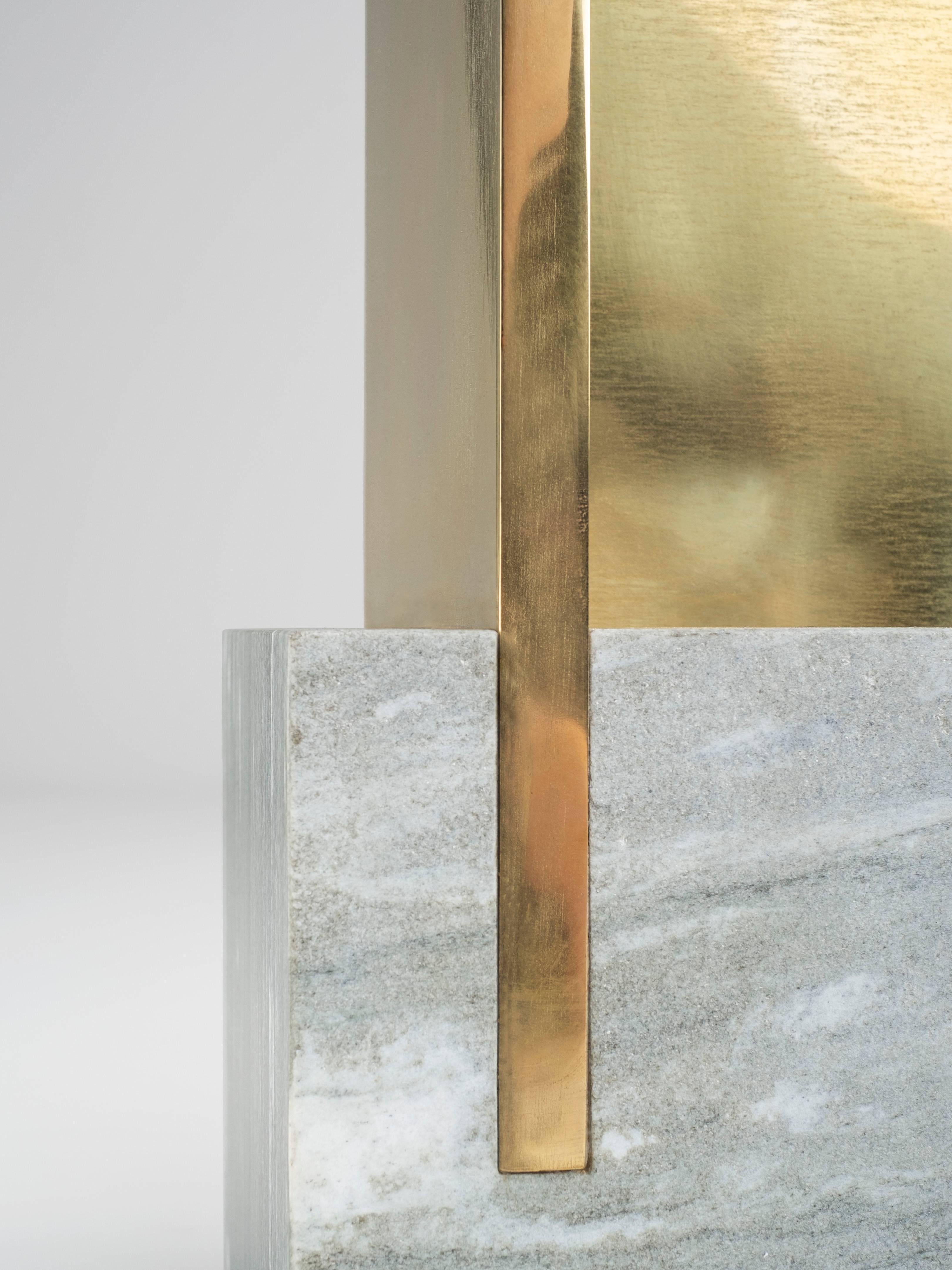 IF Table 17
Marble and brass
H55 L19 W30 cm
Edition: 8P + 2AP

The Collection ‘Further From Function’ includes seven subtle variations
of a small table ‘IF’ and a limited edition of a sculptural side table ‘KEPT’.
Produced in silver-grey