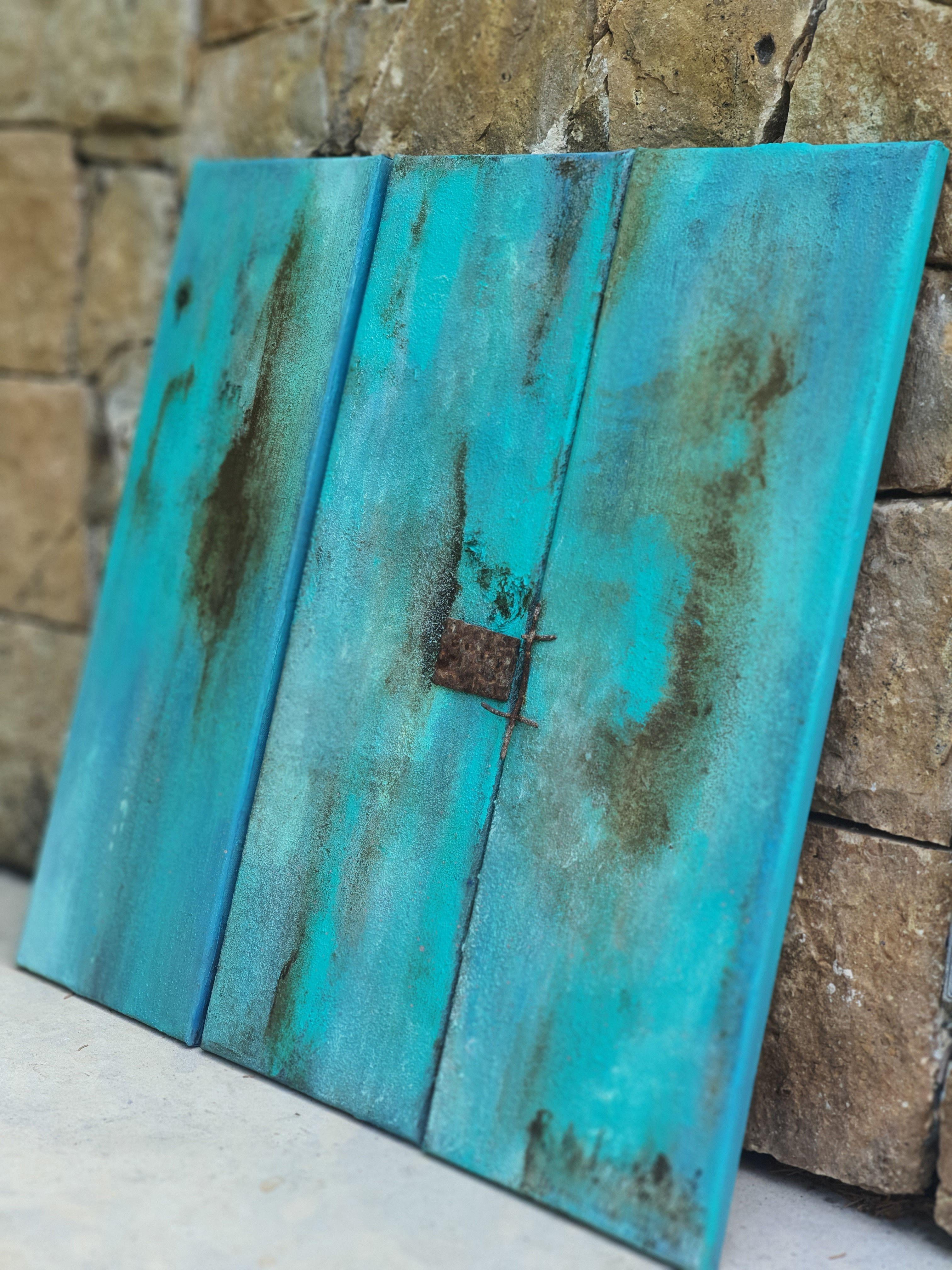 A richely textured contemporary abstract triptych painting with a beach found seawashed vintage metal object attached. The painting beautifully merges the vibrant shades of oxidized turquoise and warm rusty brown. Inspired by old, weathered windows