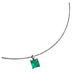 IGI 0.67Ct Colombian emerald pendant with natural diamond in 18K White Gold