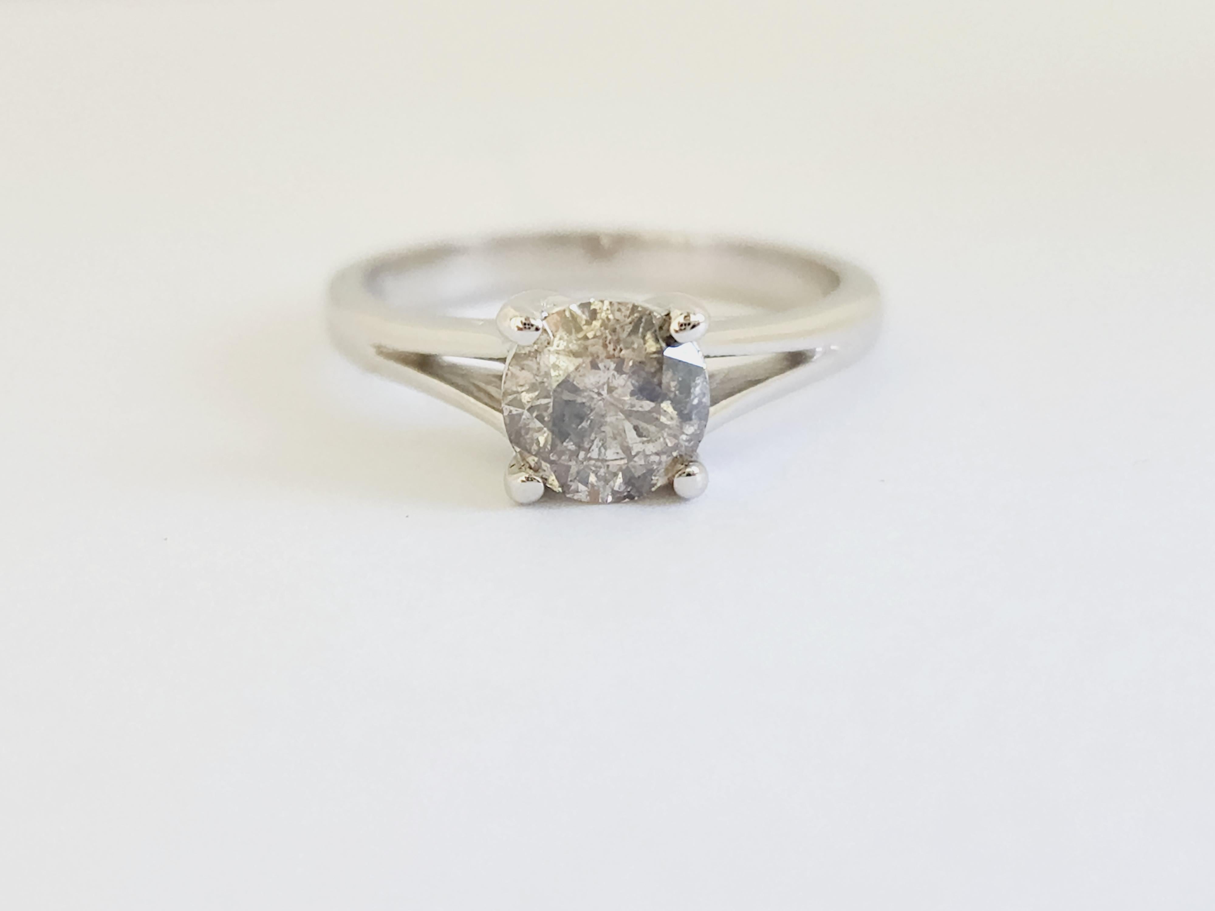 Natural IGI 1.01 Carat Gray Round Diamond Ring 14 Karat White Gold. Set on 4-prong 14K white gold ring.
Ring size: 6.5