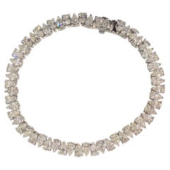 Bracelet de tennis en or blanc 14K IGI 11.20 cts F/VS1 diamants poires inversés