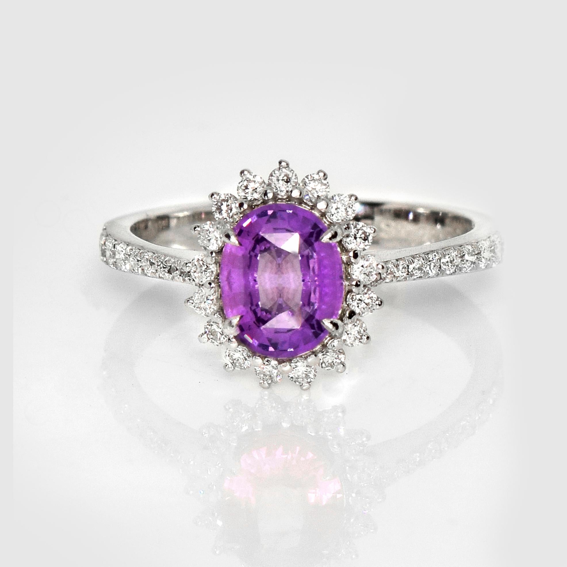 *IGI 1.26 Ct 14K Rose Gold Unheated Purple Sapphire&Diamonds Engagement Ring*

IGI-certified natural untreated purple sapphire weighing 1.26 ct set on 14K rose gold pave' design band with natural F-G, VS diamonds weighing 0.40 ct.  

The ring
