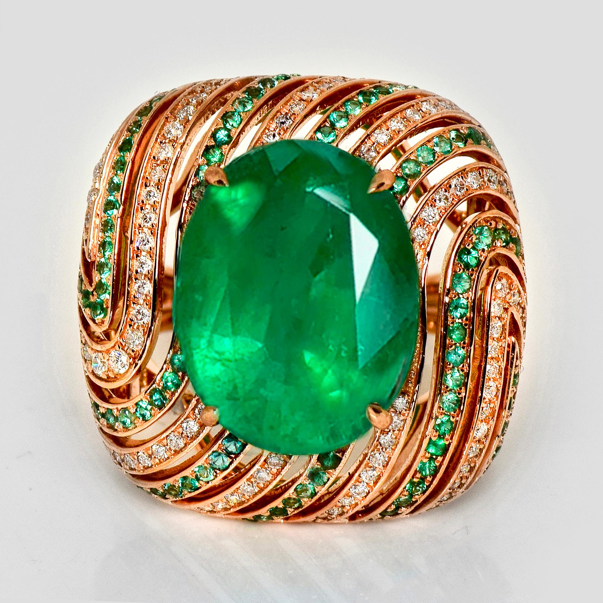 *IGI 12.84 Ct 18K Rose Gold Vivid Green Emerald Diamond Cocktail Ring*

Beautiful 18 Karat rose gold cocktail ring with a natural 12.84 ct great quality green Emerald as center stone surrounding with natural green emeralds weighing 0.47 ct and