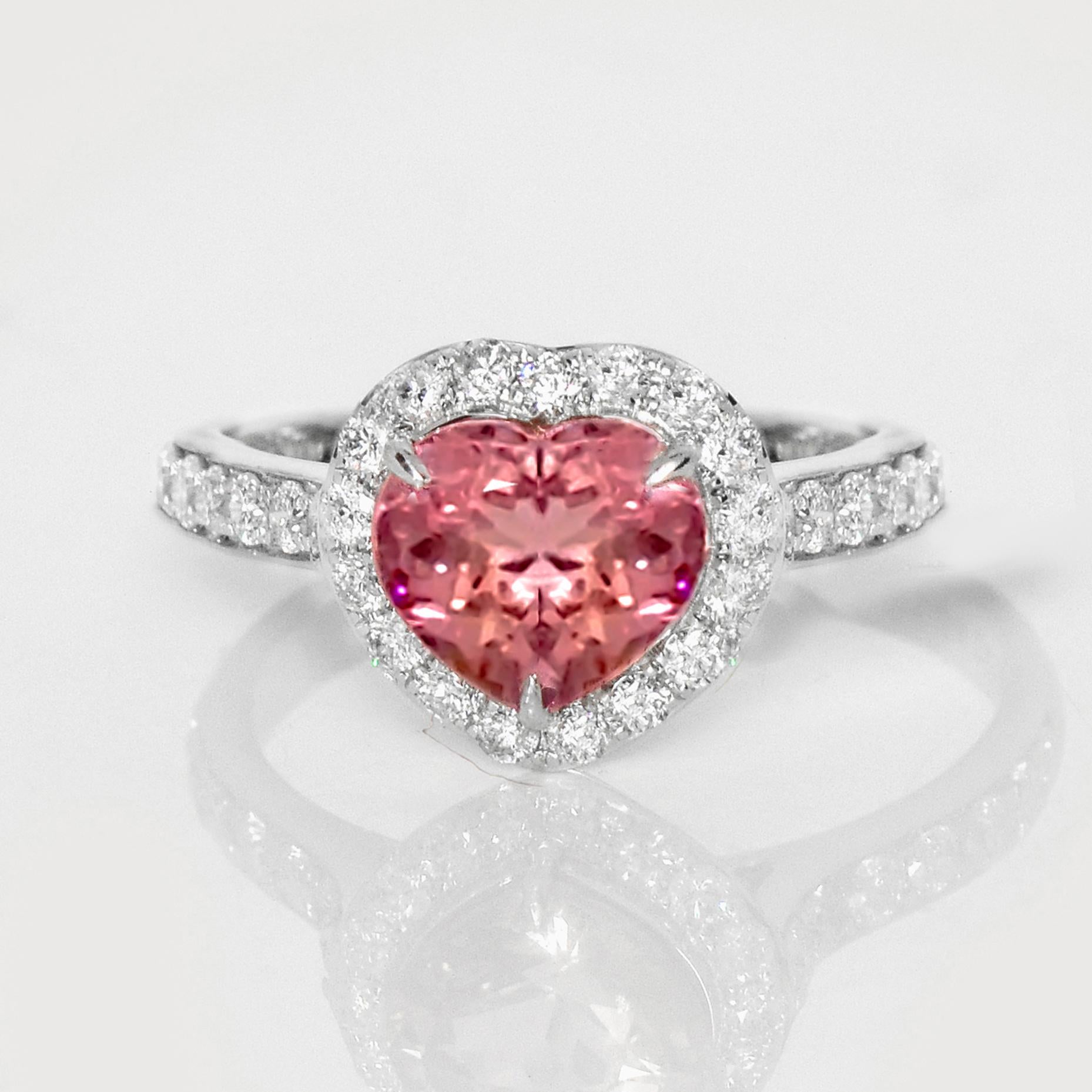 *IGI 1.34 Ct 14K White Gold Pink Spinel&Diamonds Engagement Ring*

IGI-certified natural untreated pink spinel weighing 1.34 ct set on 14K white gold pave' design band with natural FG, VS diamonds weighing 0.48 ct.  

The ring combines fashion and
