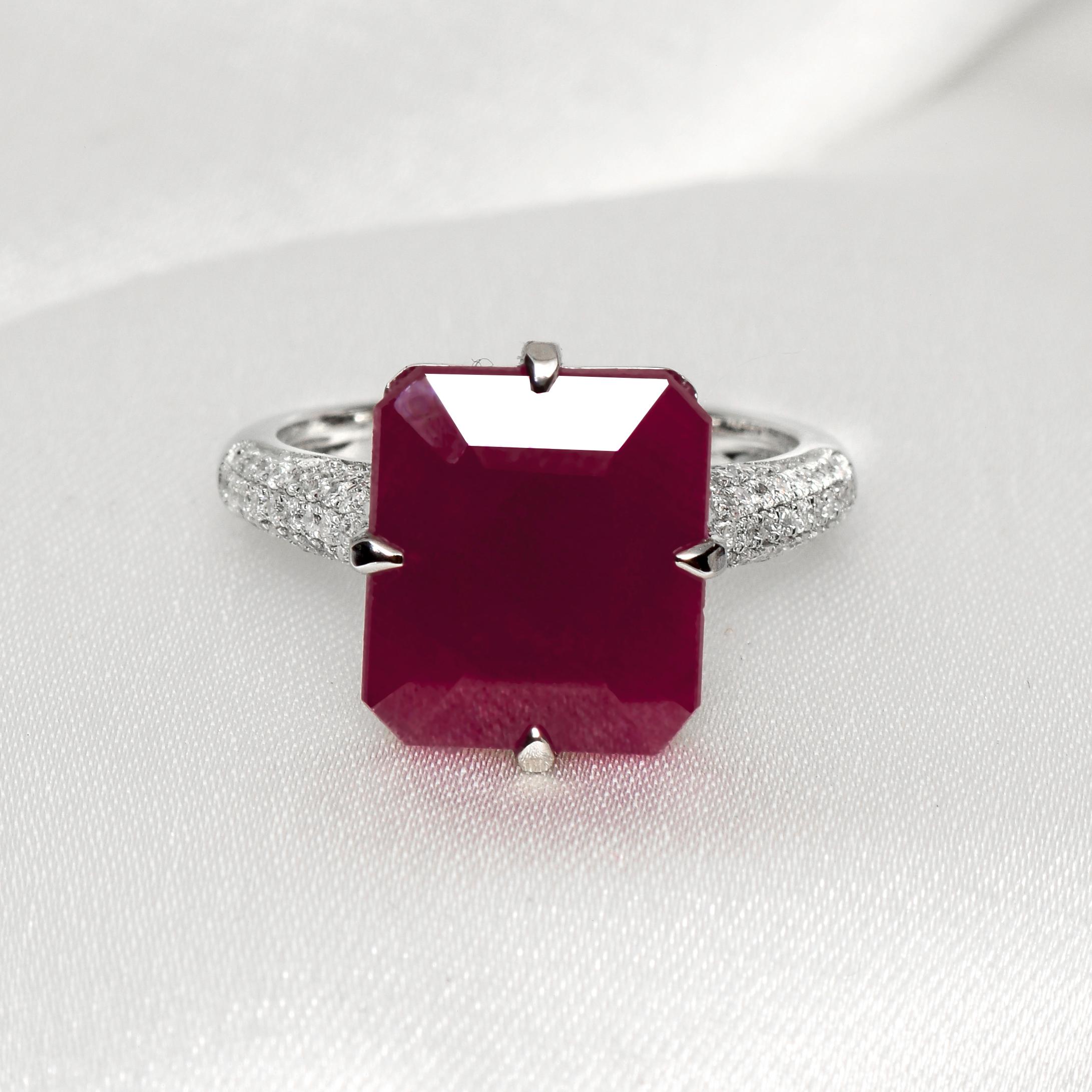 ** IGI-Certified 14K White Gold 10.25 Ct Natural Ruby & Diamonds Engagement Ring**
One IGI-Certified natural unheated purplish red ruby as the center stone weighing 10.25 ct surrounded by the FG VS accent diamonds weighing 0.31 ct on the 14K white