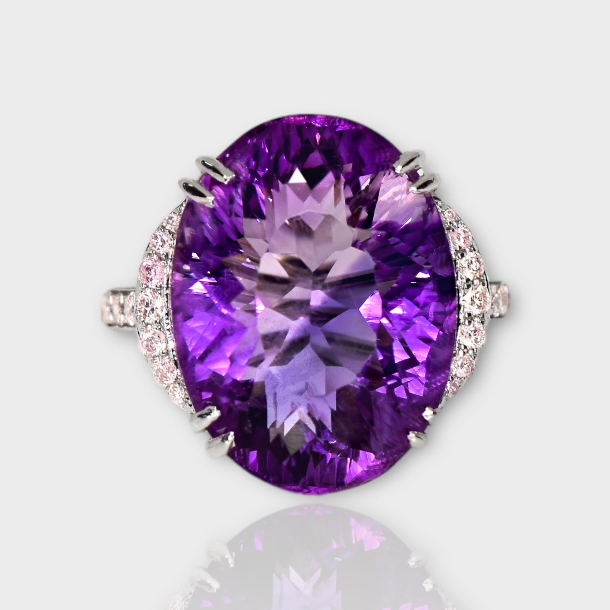 *IGI 14K 15.44 Ct Amethyst&0.41 Ct Pink Diamond Antique Engagement Ring*
The natural intense purple Amethyst, weighing 15.44 ct, is the center stone surrounded by natural pink diamonds weighing 0.41 ct on the 14K white gold halo design band.

The