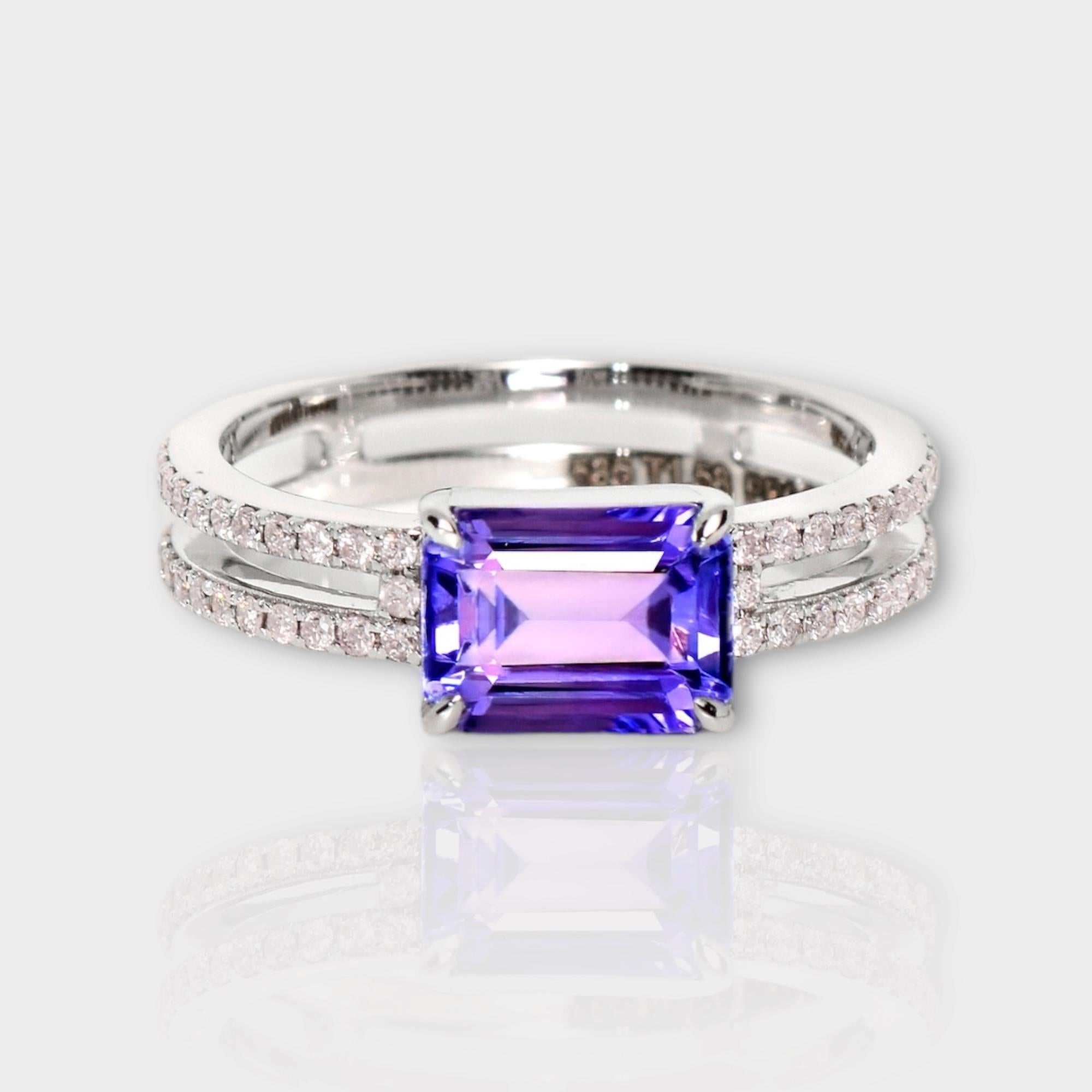 *IGI 14K 1.58 ct Tanzanite&Pink Diamond Antique Art Deco Style Engagement Ring*
The natural intense bluish violet tanzanite, weighing 1.58 ct, is the center stone surrounded by natural pink diamonds weighing 0.25 ct on the 14K white gold halo design