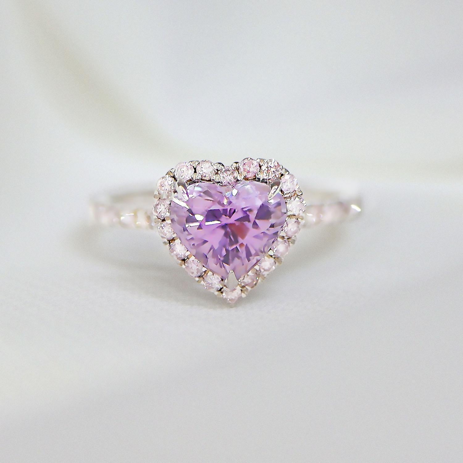 *IGI 14K 1.73 Ct Purple Spinel&Pink Diamonds Antique Engagement Ring*

IGI-certified natural untreated purple spinel weighing 1.73 ct set on 14K white gold pave' design band with natural pink diamonds weighing 0.34 ct.  

The ring combines fashion