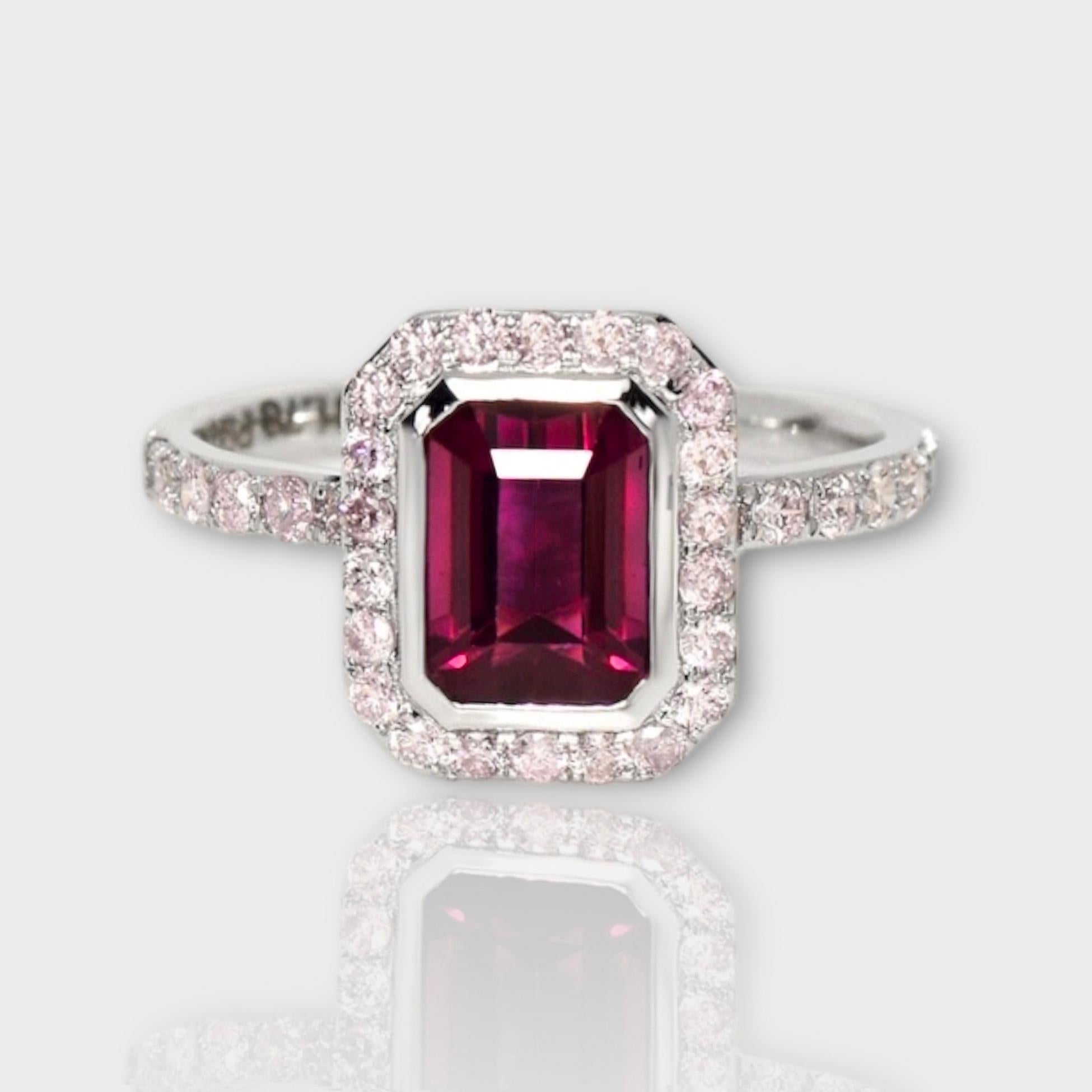 *IGI 14K 1.78 Ct Intense Purple Spinel&Pink Diamonds Antique Engagement Ring*

IGI-certified natural untreated intense reddish-purple spinel weighing 1.78 ct set on 14K white gold pave' design band with natural pink diamonds weighing 0.52 ct.  

The