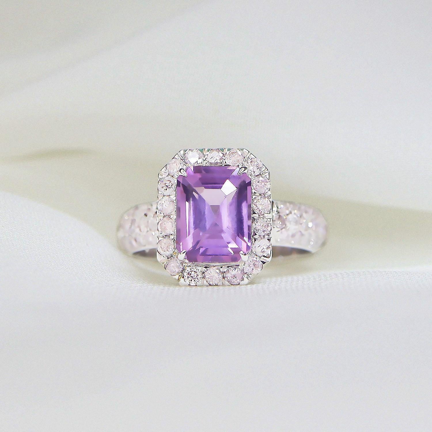 *IGI 14K 2.05 Ct Pinkish Purple Spinel&Pink Diamonds Antique Engagement Ring*

IGI-certified natural untreated pinkish-purple spinel weighing 2.05 ct set on 14K white gold luxury table pave' design band with natural pink diamonds weighing 0.77 ct. 
