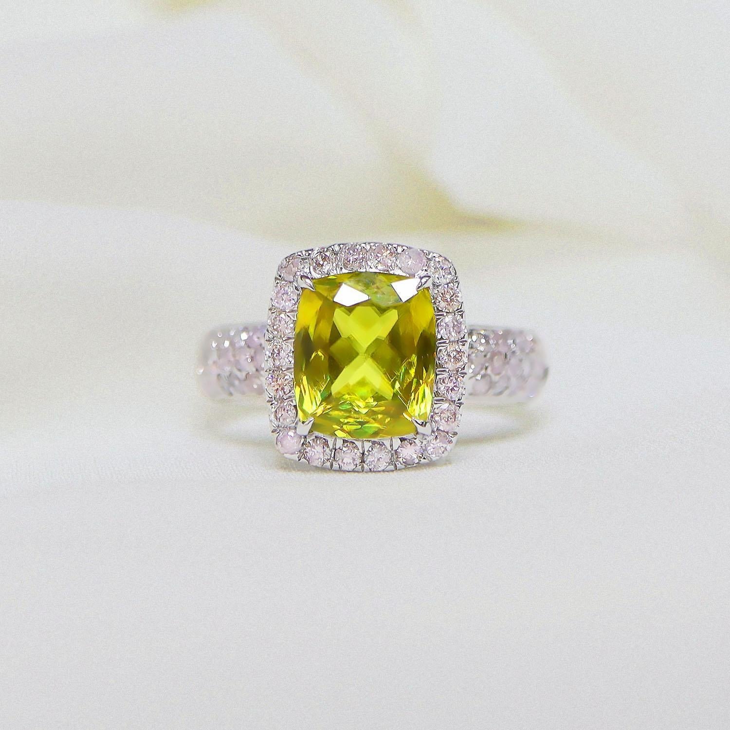 *IGI 14K 2.10 Ct  Sphene&Pink Diamonds Antique Art Deco Style Engagement Ring*

Natural Intensive greenish-yellow Sphene weighing 2.10 ct set on the 14K white gold pave' design band with natural round brilliant cut pink diamonds weighing 0.64