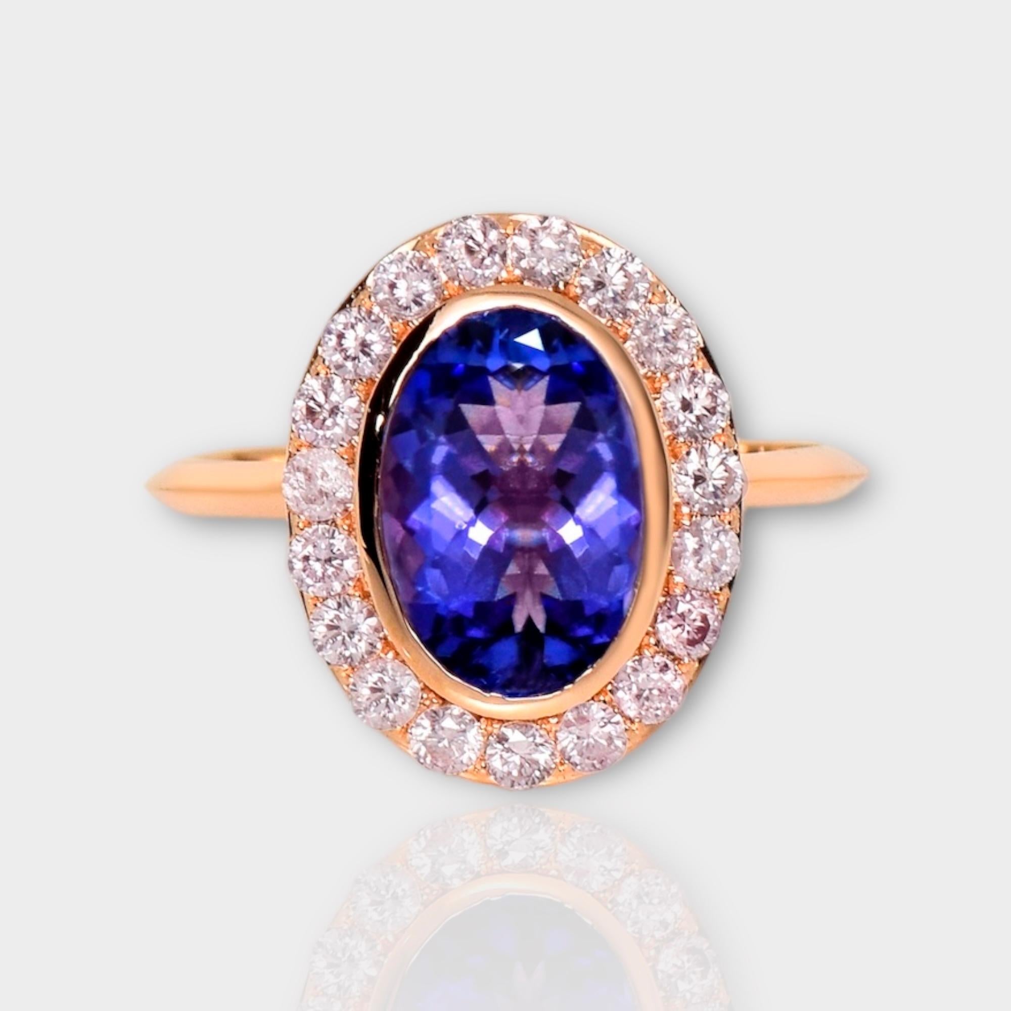 *IGI 14K 2.15 ct Tanzanite&Pink Diamond Antique Art Deco Style Engagement Ring*
The natural intense bluish violet tanzanite, weighing 2.15 ct, is the center stone surrounded by natural pink diamonds weighing 0.52 ct on the 14K pink gold halo design
