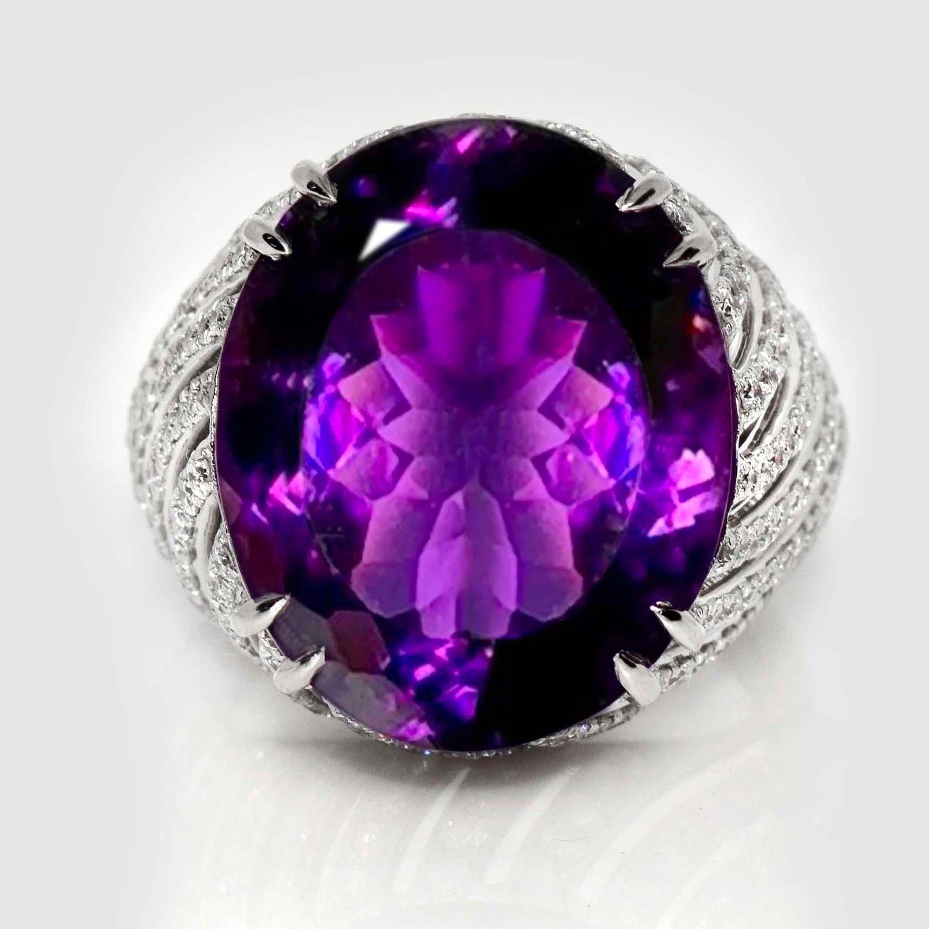 *IGI 14K 23.07 ct  Natural Purple Amethyst Diamonds Antique Engagement Ring*
This ring features a 23.07-carat natural purple Amethyst. It is set on a 14K white gold band and accented with natural F-G, VS diamonds weighing 1.63 carats.

This elegant