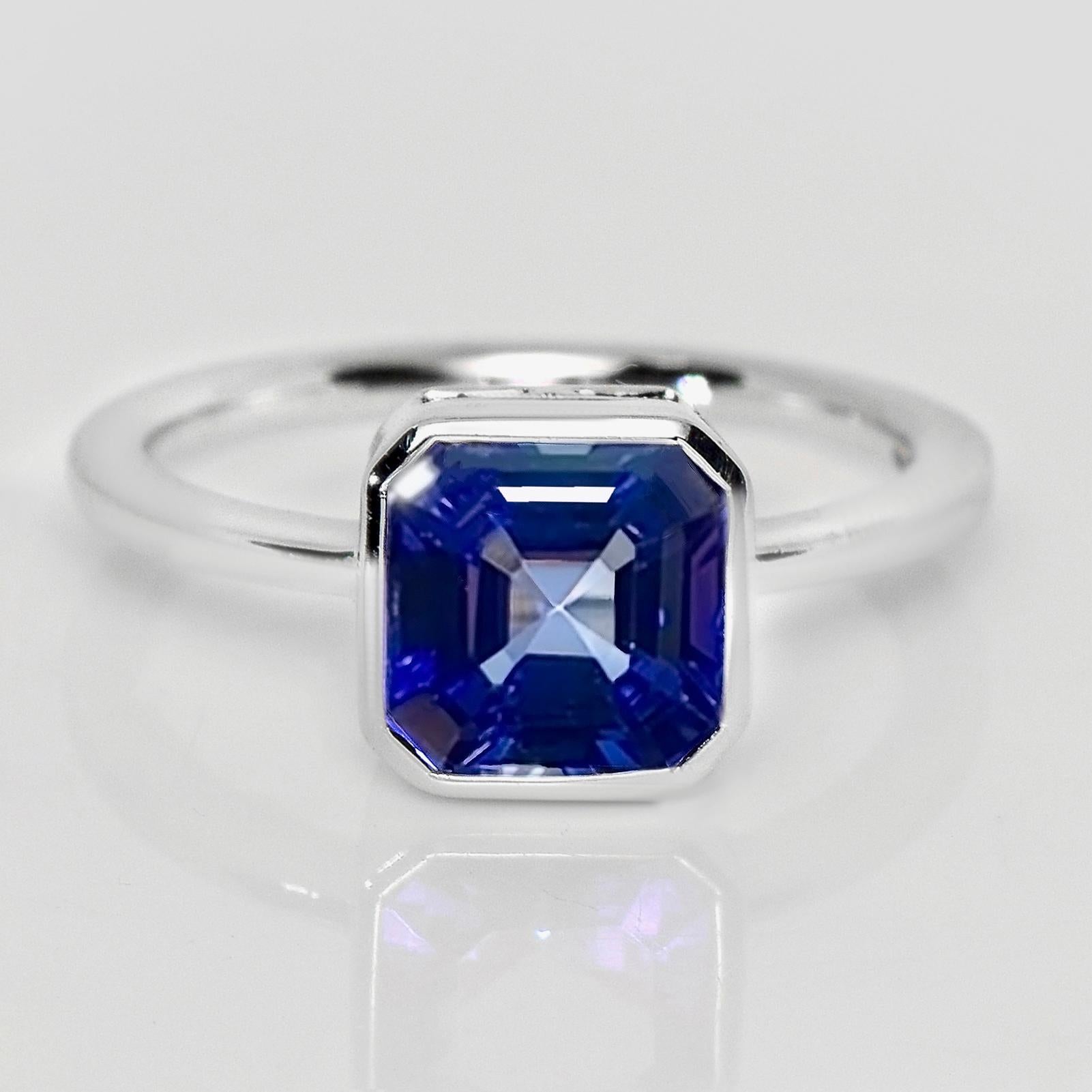 *IGI 14K 2.56 Ct White Gold Vivid Tanzanite Engagement Ring*

One IGI-Certified natural top-quality vivid blue Tanzanite as the center stone weighing 2.56 ct
 set on the 14K white gold bezel design band to make the ring more shining and protect the