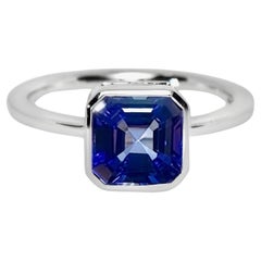 IGI 14K 2.56 Ct White Gold Vivid Tanzanite Engagement Ring