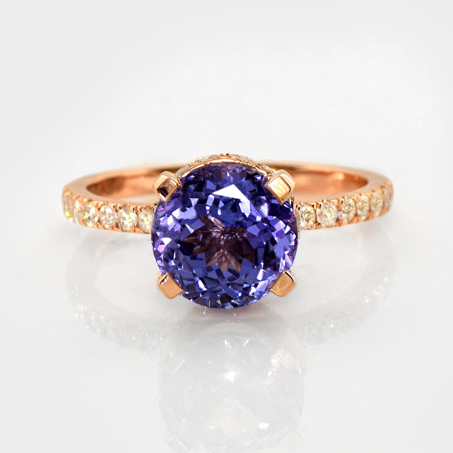 *IGI 14K 2.67 Ct Natural Tanzanite&Diamonds Antique Engagement Ring*

An IGI-certified natural bluish-violet Tanzanite weighing 2.67 ct set on a 14K rose gold luxury table design band with natural F-G, VS diamonds weighing 0.45 ct.

The ring
