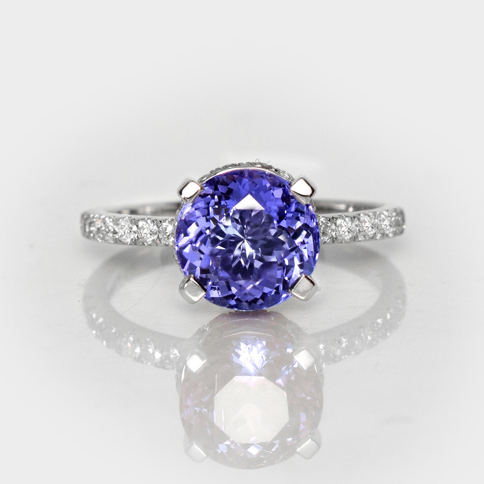 *IGI 14K 2.67 Ct Natural Tanzanite&Diamonds Antique Engagement Ring*

An IGI-certified natural bluish-violet Tanzanite weighing 2.67 ct set on a 14K white gold luxury table design band with natural F-G, VS diamonds weighing 0.45 ct.

The ring