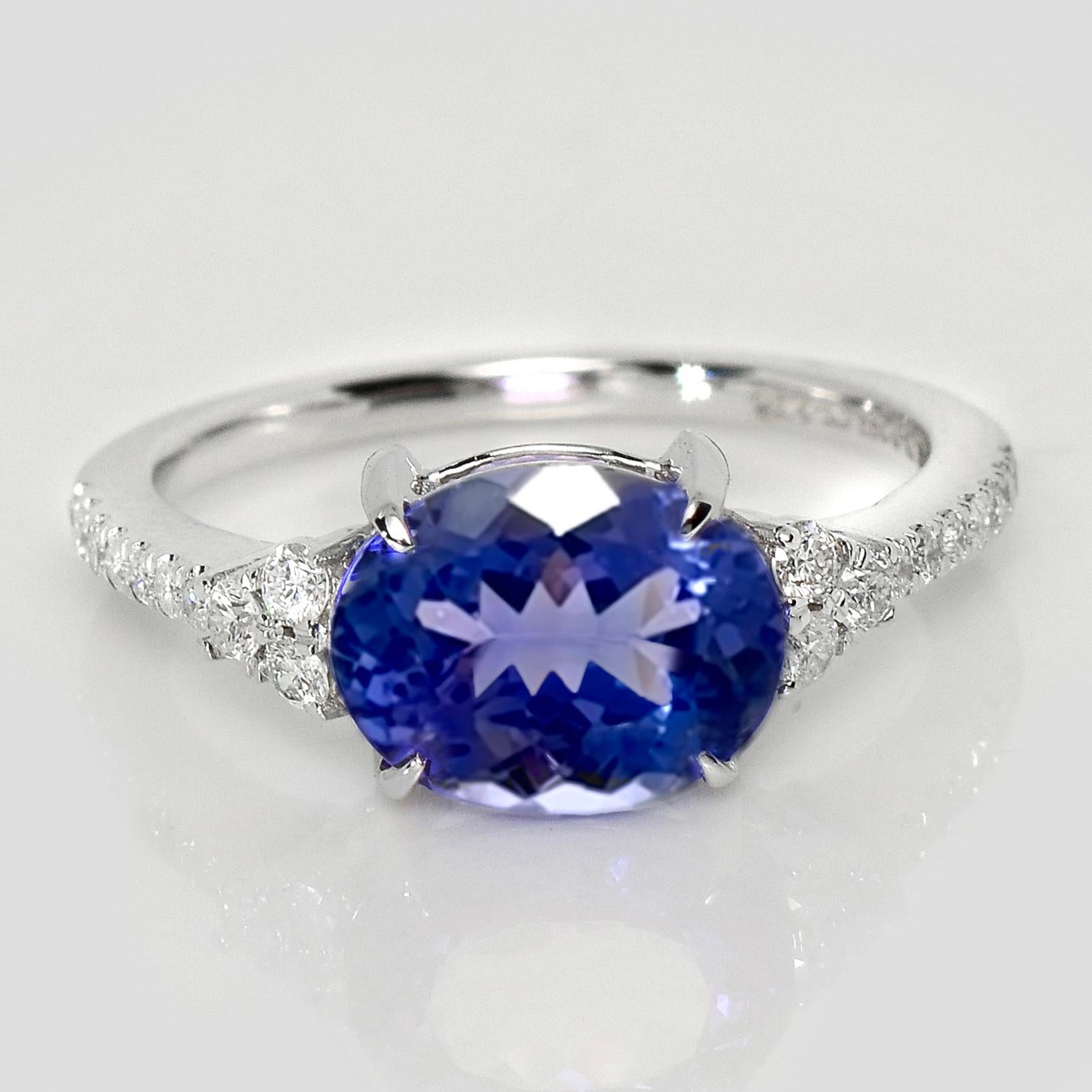 *IGI 14K 2.94 Ct White Vivid Tanzanite&Diamonds Engagement Ring*

One IGI-Certified natural top-quality vivid blue Tanzanite as the center stone weighing 2.94 ct
surrounding by the FG VS accent diamonds weighing 0.25 ct to make the ring more shining