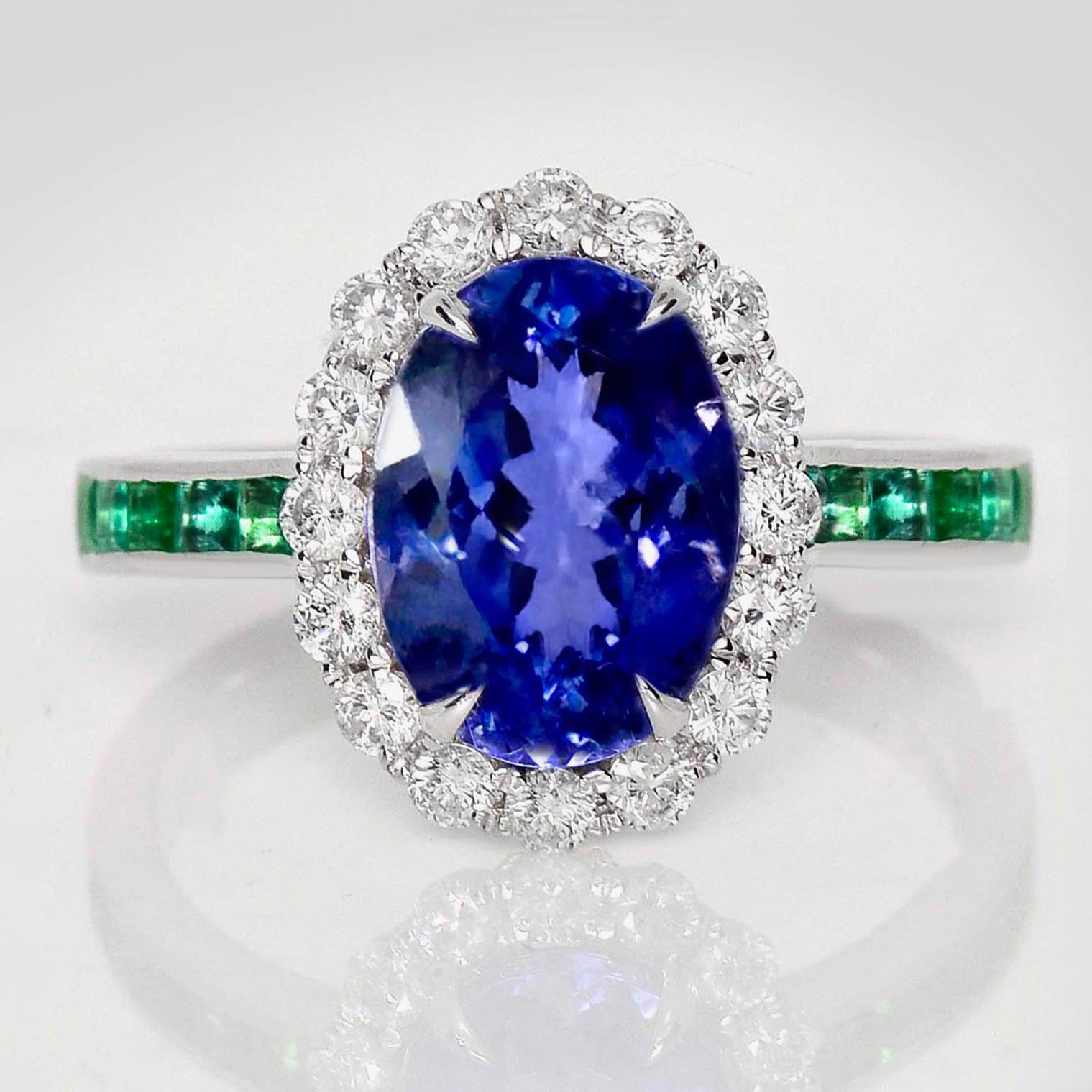 *IGI 14K 2.97 Ct Natural Tanzanite&Diamonds&Emeralds Antique Engagement Ring*

An IGI-certified natural intense bluish-violet Tanzanite weighing 2.97 ct set on a 14K white gold luxury table design band with natural F-G, VS diamonds weighing 0.40 ct