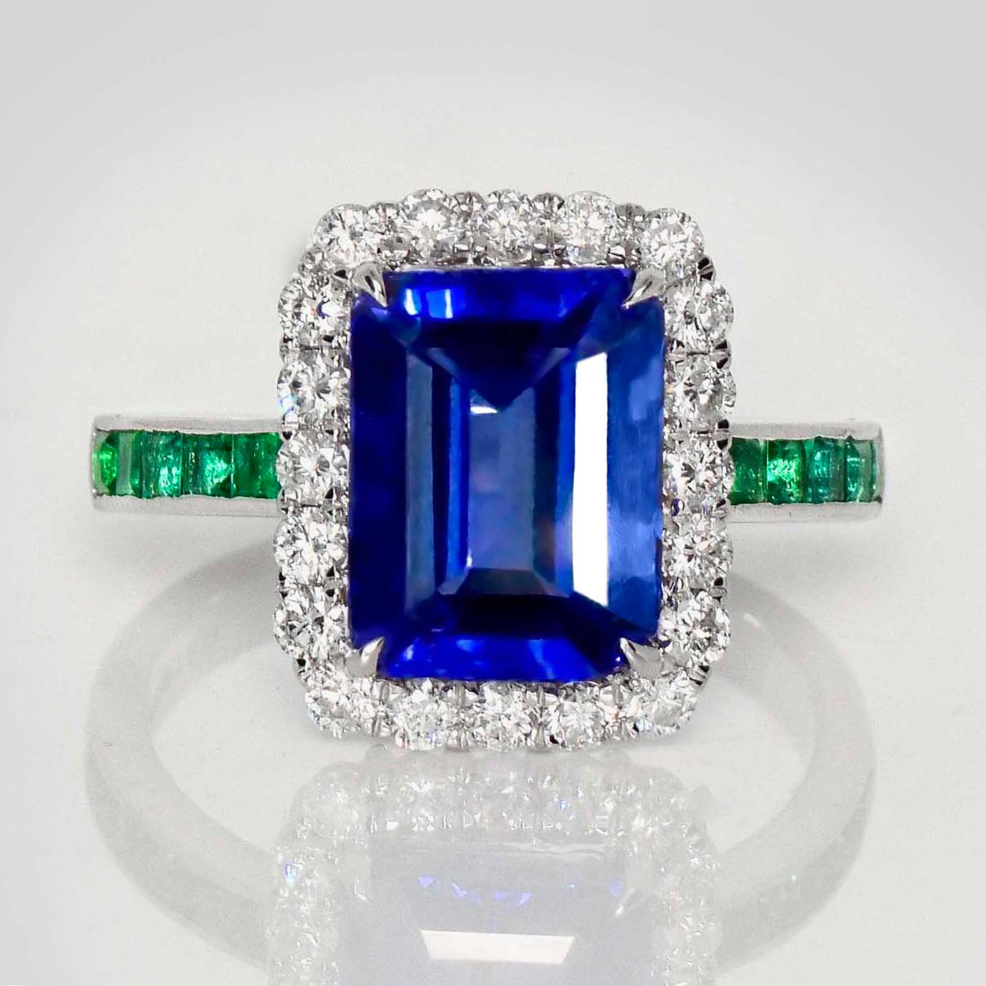 *IGI 14K 3.63 Ct Natural Tanzanite&Diamonds&Emeralds Antique Engagement Ring*

An IGI-certified natural intense bluish-violet Tanzanite weighing 3.63 ct set on a 14K white gold luxury table design band with natural F-G, VS diamonds weighing 0.49 ct