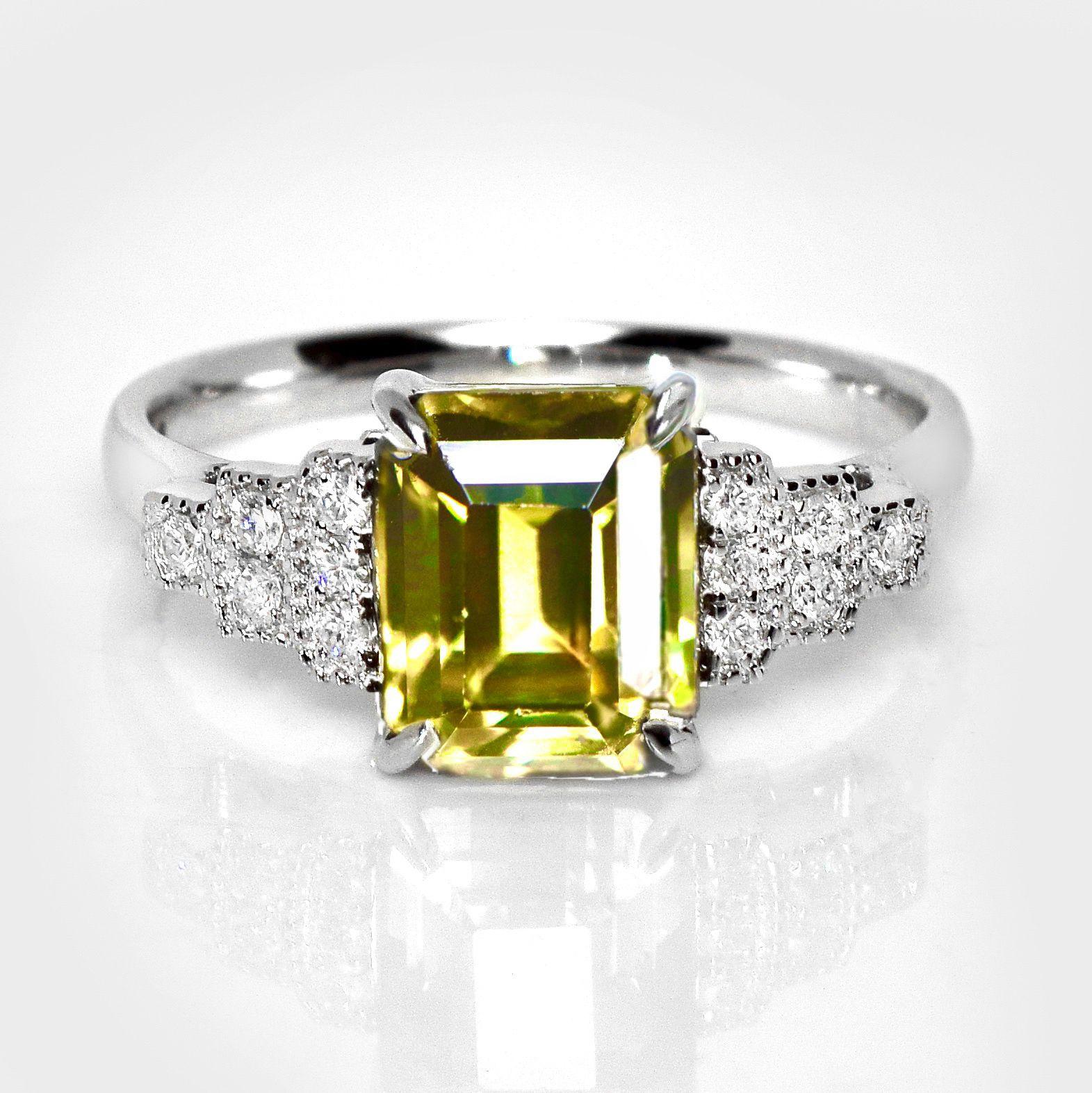 *IGI 14K 3,95 qt Circón verde vivo natural Anillo de compromiso Art Déco antiguo*

Circón natural de color verde amarillento vivo y talla maestra, certificado por el IGI, con un peso de 3,95 quilates, engastado en la banda de oro blanco de 14