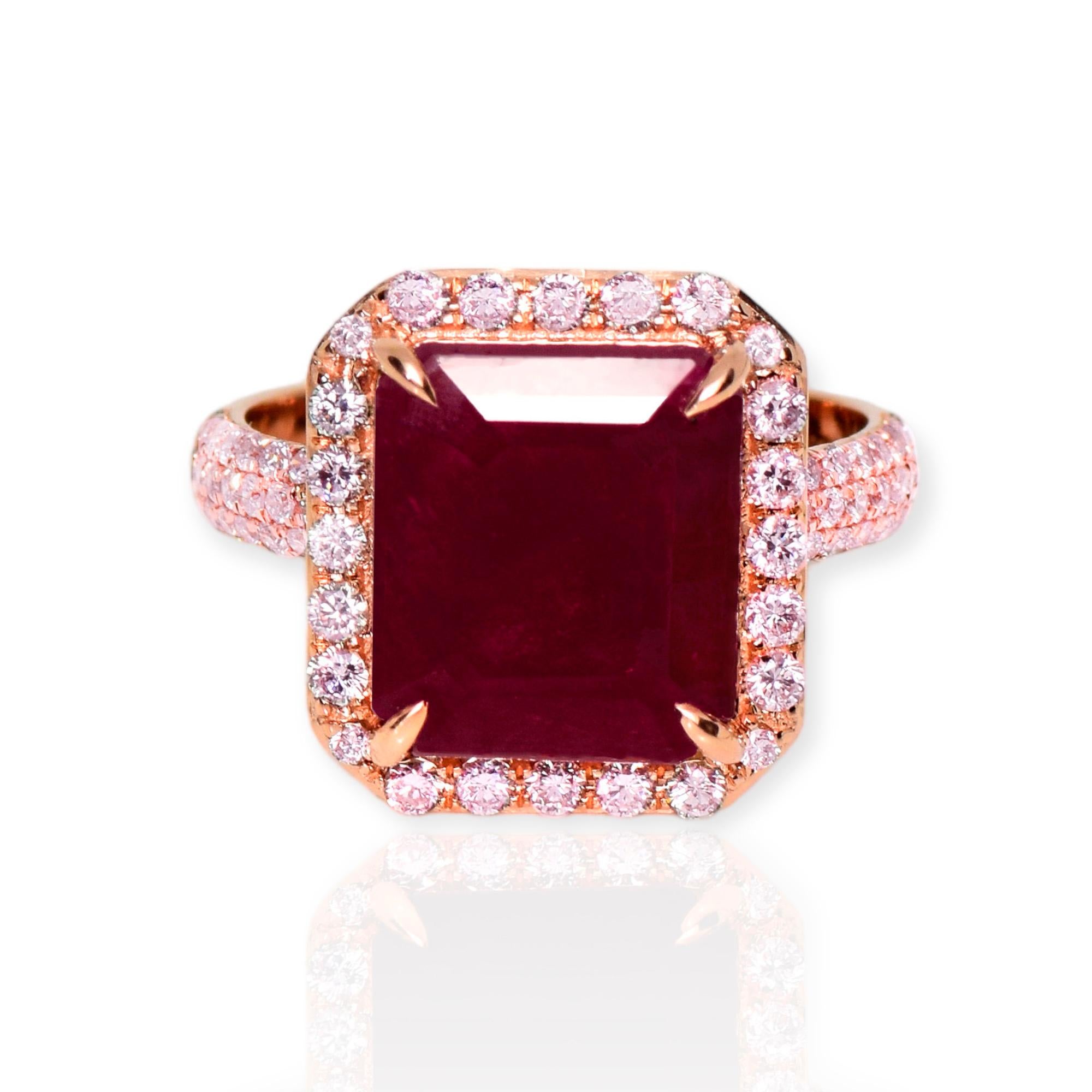 *IGI 14K 6.70 ct Natural Unheated Red Ruby&0.77 ct Pink Diamonds Engagement Ring*

IGI-certified natural untreated, deep red ruby weighing 6.70 ct set on 14K rose gold luxury table pave' design band with natural pink diamonds weighing 0.77 ct. 