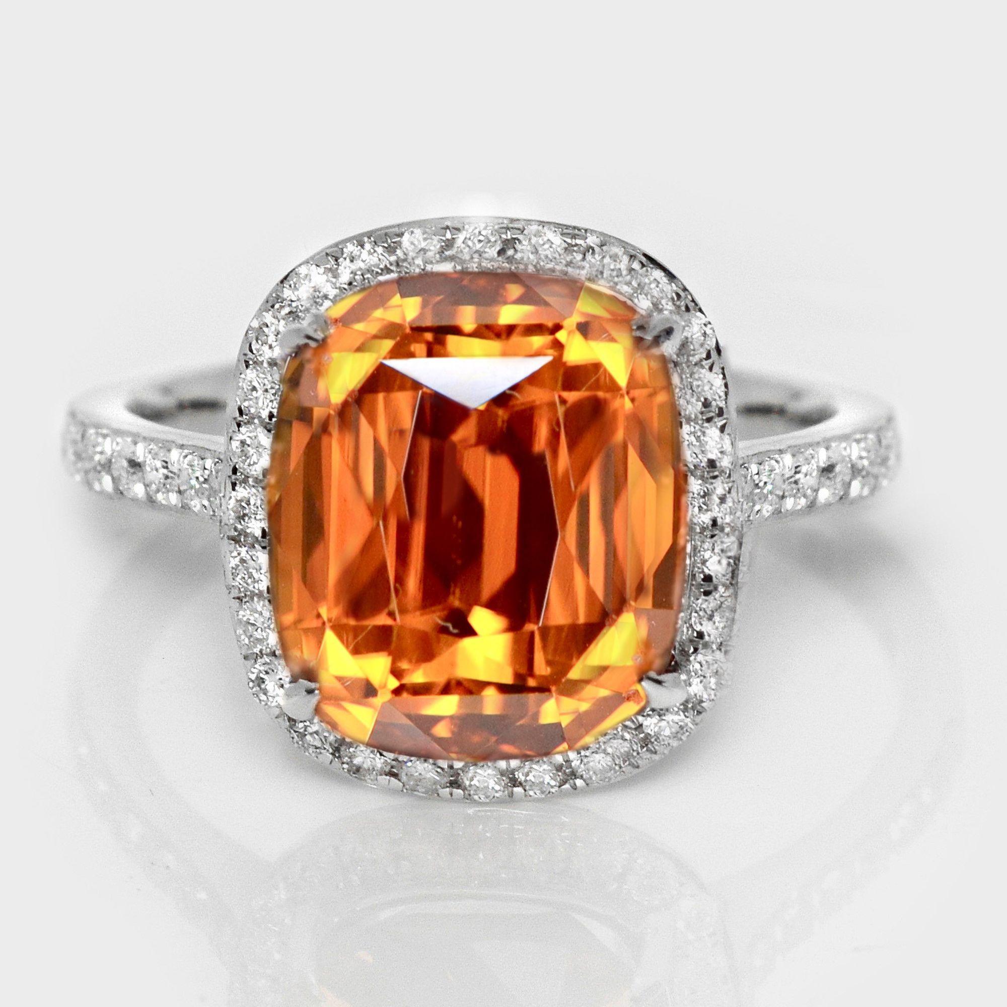 *IGI 14K 6.97 Ct Natürlicher Orange Brauner Zirkon Antiker Art Deco Verlobungsring*

IGI-zertifizierter, natürlicher, intensiv orangebrauner Zirkon im Master-Schliff mit einem Gewicht von 6,97 ct, gefasst auf einem Band aus 14 Karat Weißgold mit FG