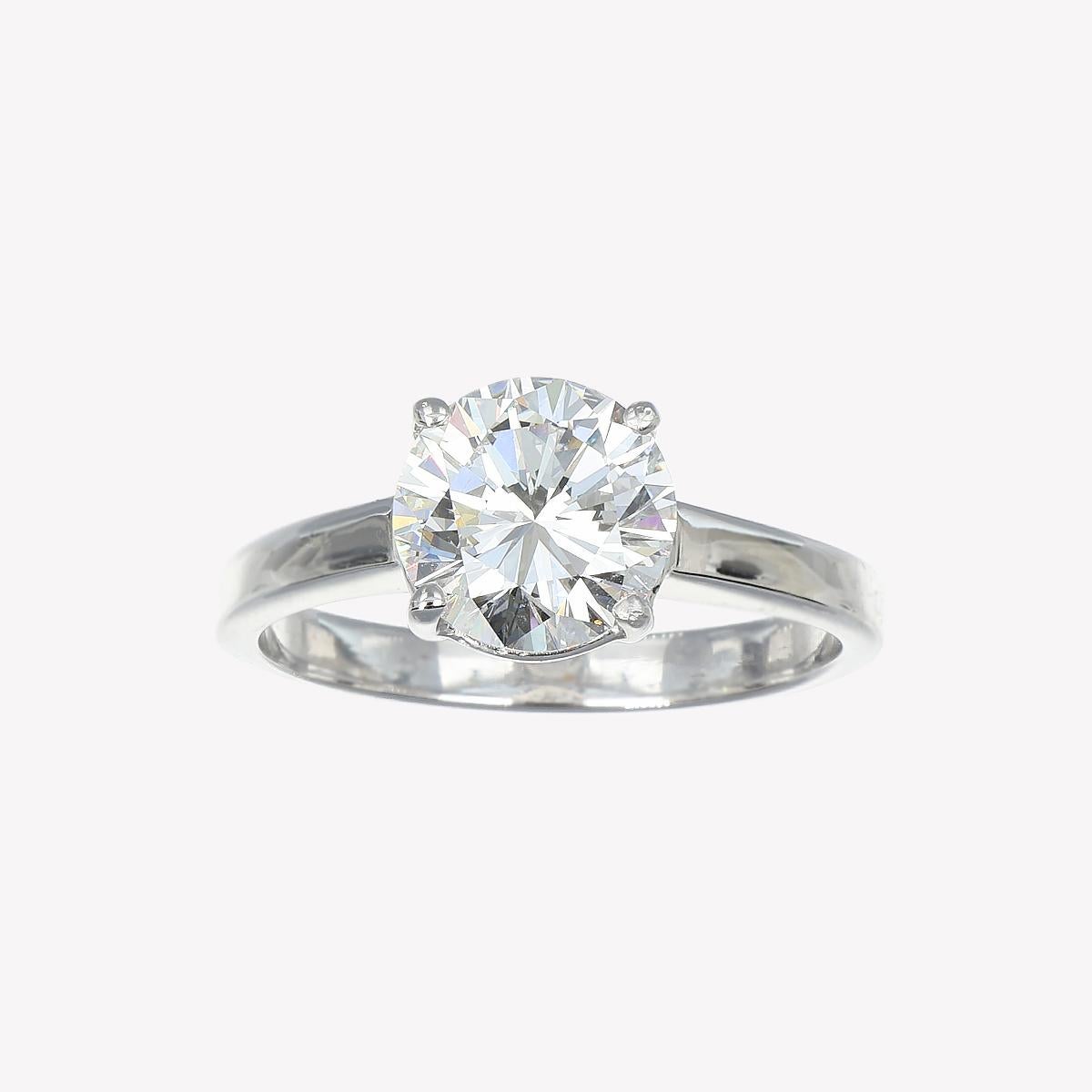 The essence of perfection and eternal promise is crystallized in this solitaire ring, where the brilliant-cut diamond stands as the undisputed centerpiece. It radiates pure and untainted light, a rare D color that symbolizes the dawn's first light.