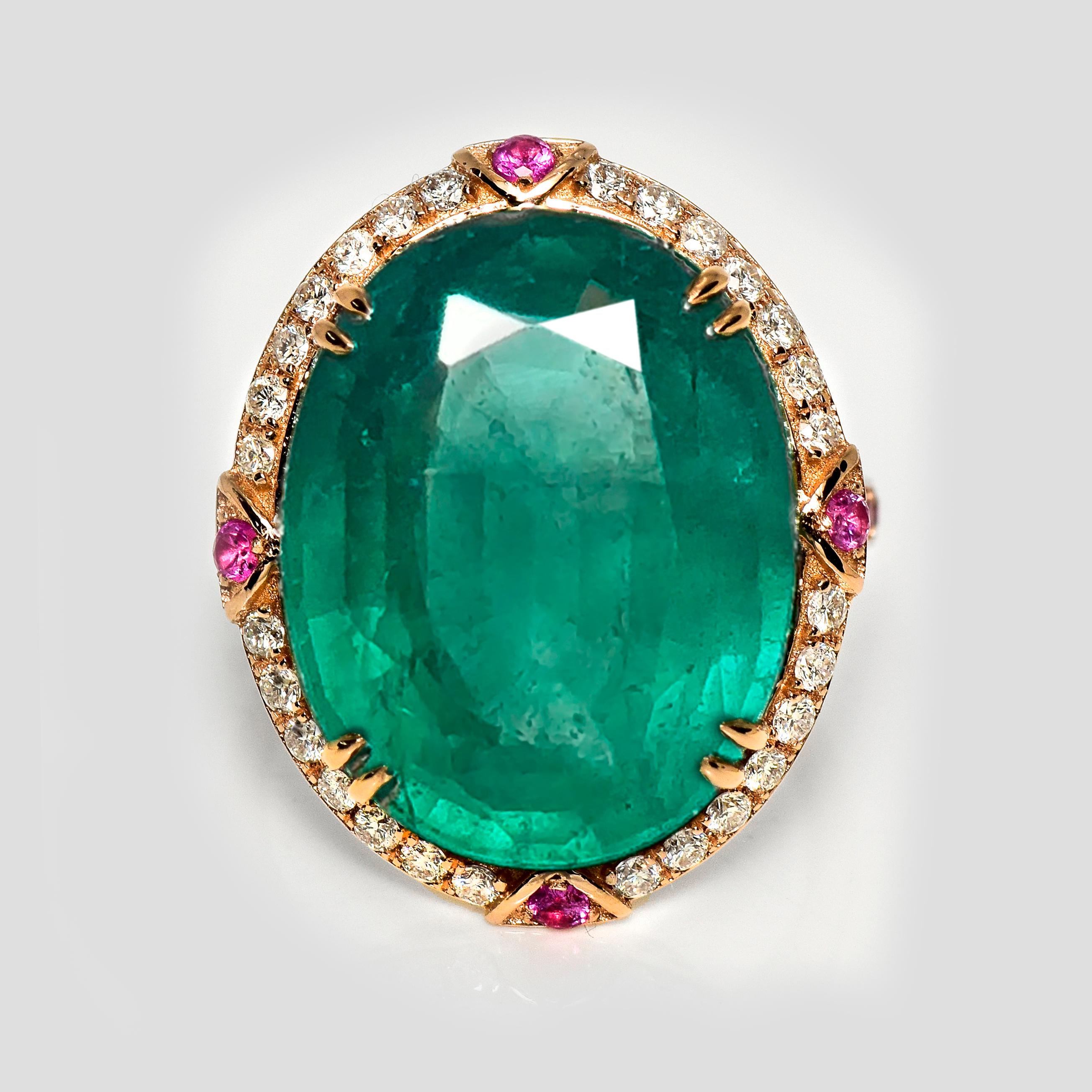 *IGI 16.49 Ct 18K Rose Gold Vivid Green Emerald Diamond Cocktail Ring*

Beautiful 18 Karat rose gold cocktail ring with a natural 16.49 ct great quality green Emerald as center stone surrounding with natural pink Sapphires weighing 0.39 ct and